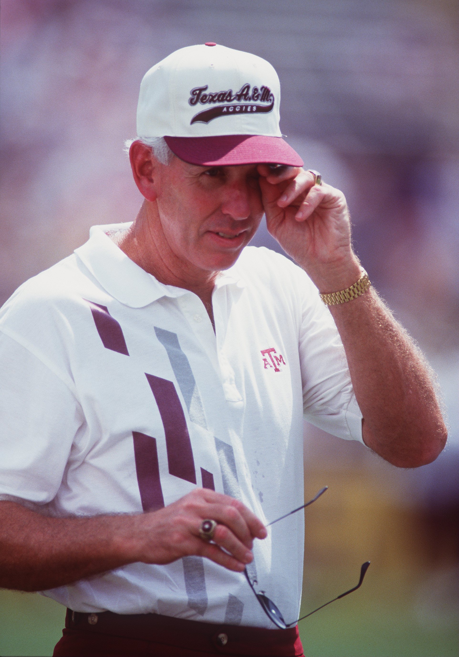 5 Sep 1992: Head coach R.C. Slocum of Texas A&M wipes hit brow during the Aggies 31-22 win over LSU at Kyle Field in College Station, Texas.