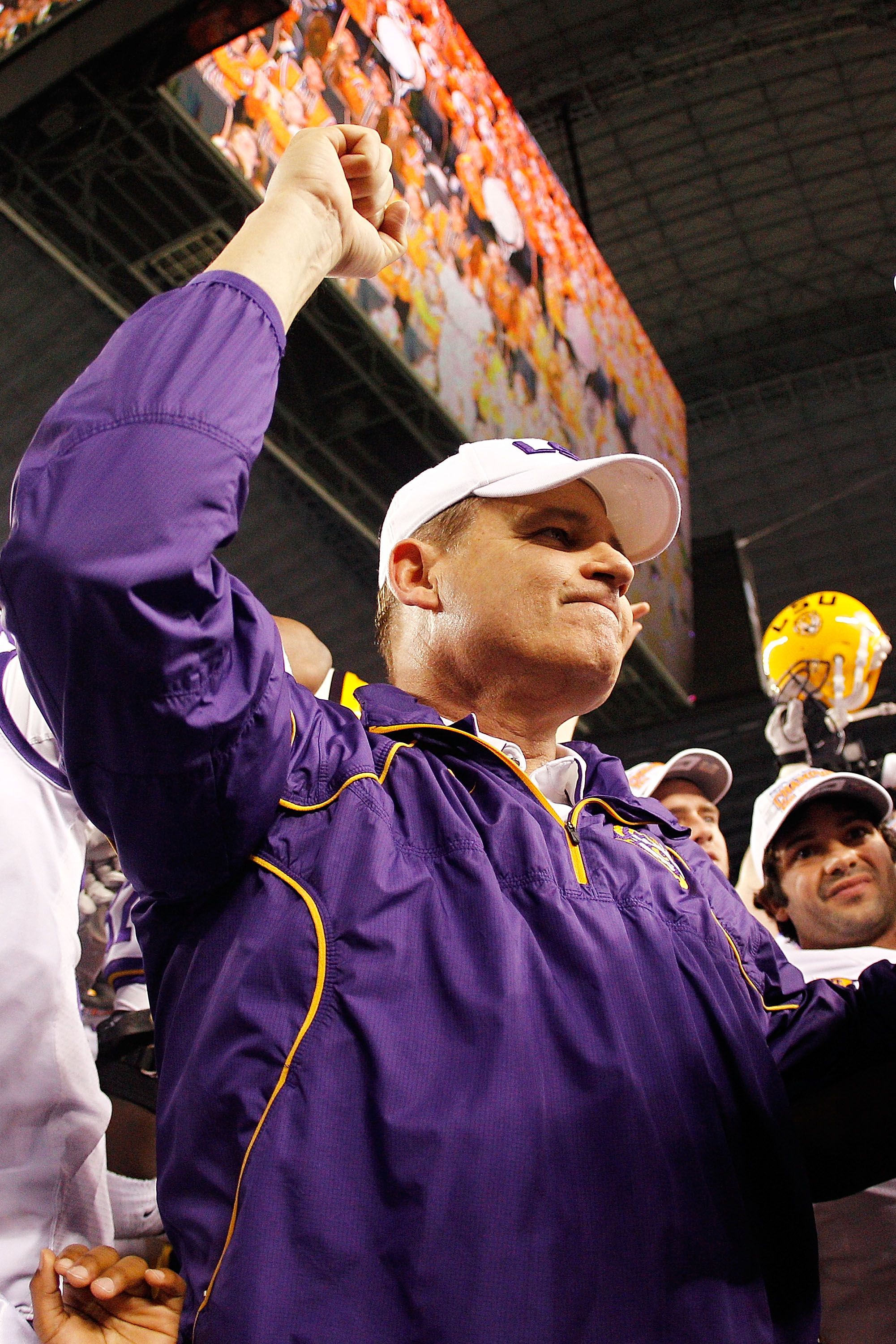 ARLINGTON, TX - JANUARY 07:  Head coach Les Miles of the Louisiana State University Tigers celebrates after defeating the Texas A&M Aggies 41-24 during the AT&T Cotton Bowl at Cowboys Stadium on January 7, 2011 in Arlington, Texas.  (Photo by Chris Grayth
