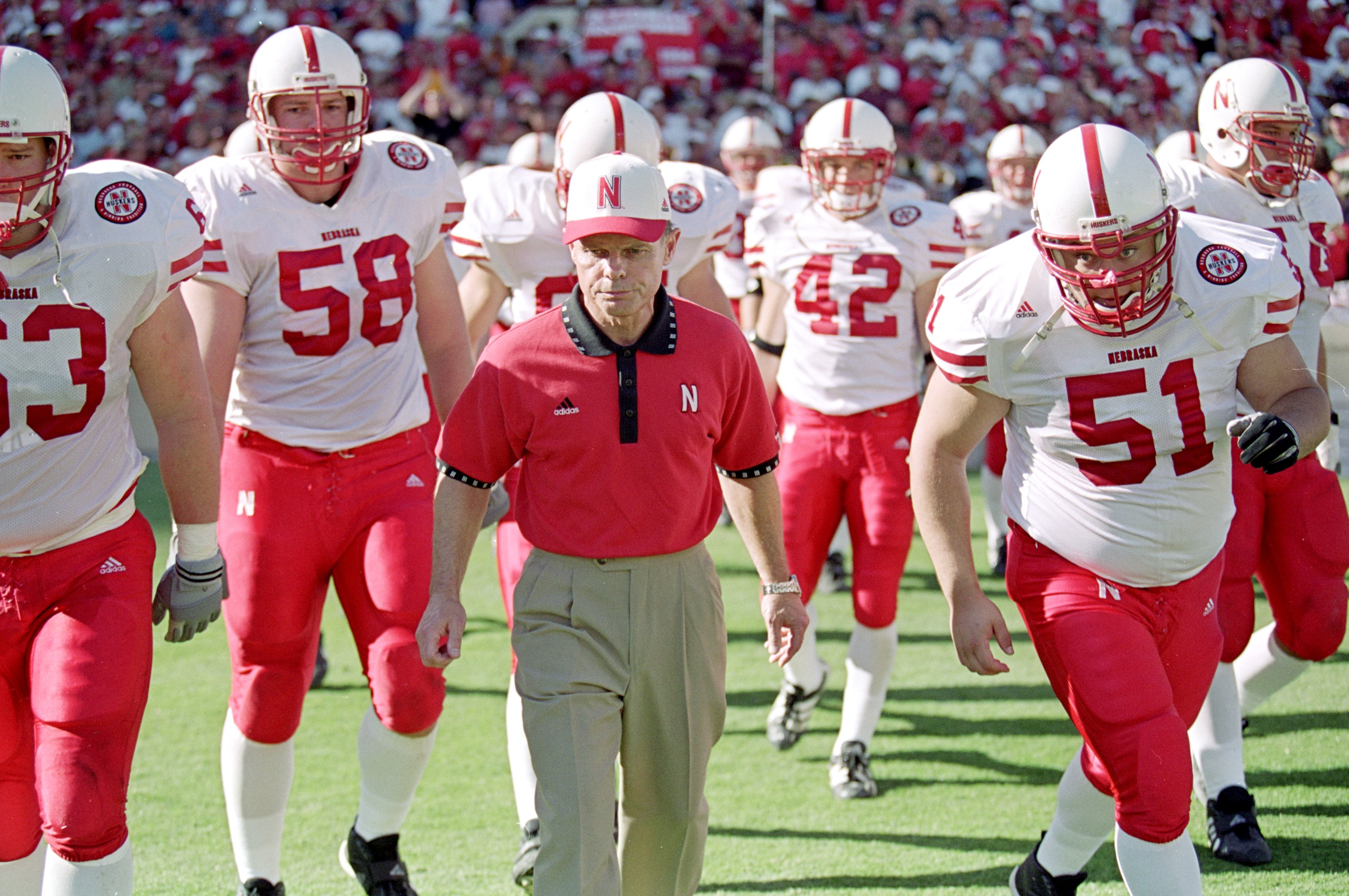 23 Oct 1999: Head coach Frank Solich of the Nebraska Cornhuskers walks out on the field with his players before a game against the Texas Longhorns at the Texas Memorial Stadium in Austin, Texas. The Longhorns defeated the Cornhuskers 24-20. Mandatory Cred
