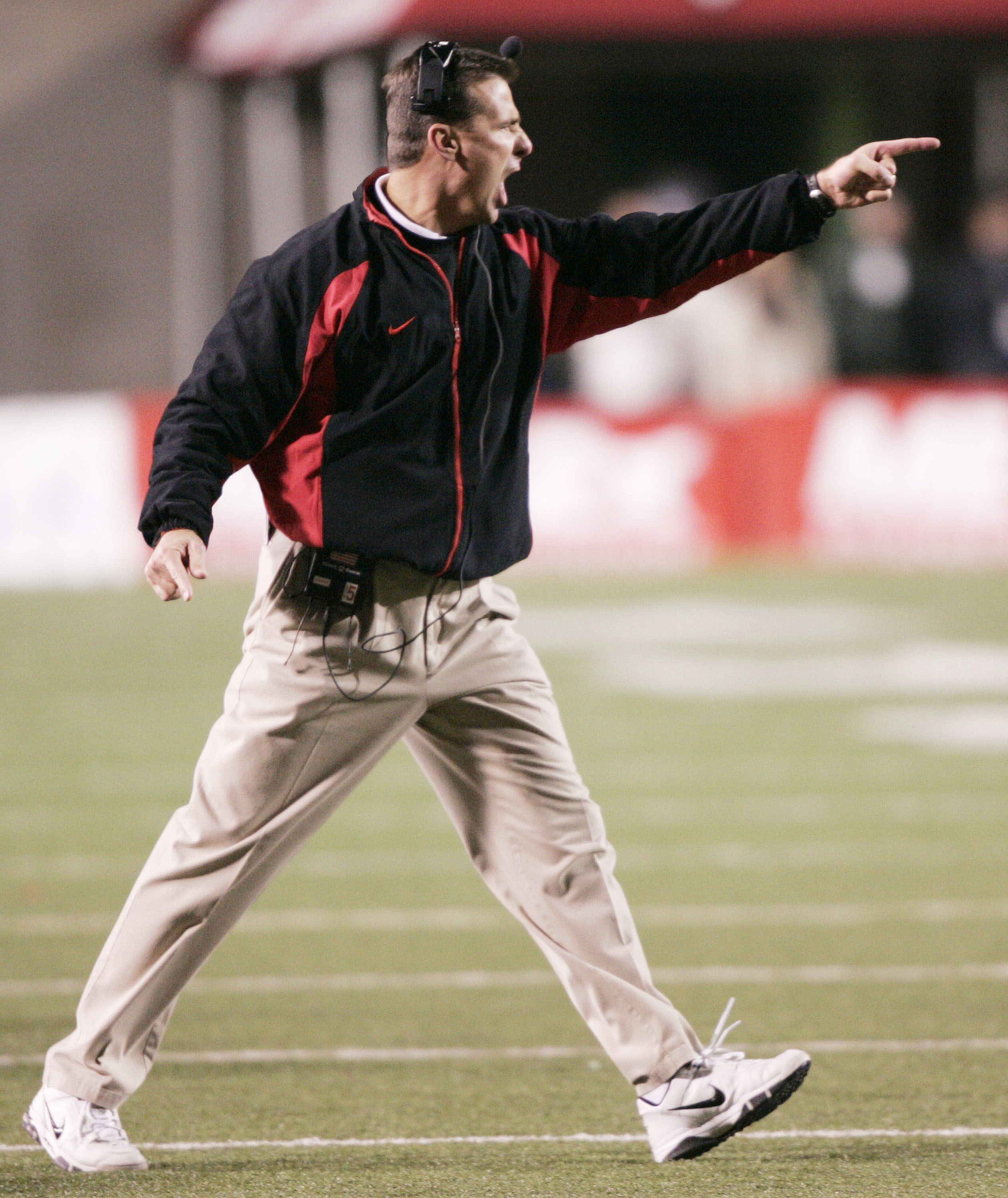 SALT LAKE CITY, UT - NOVEMBER 20: University of Utah head coach Urban Meyer yells at his players during a game against BYU November 20, 2004 at Rice Eccles Stadium in Salt Lake City, Utah. (Photo by George Frey/Getty Images)