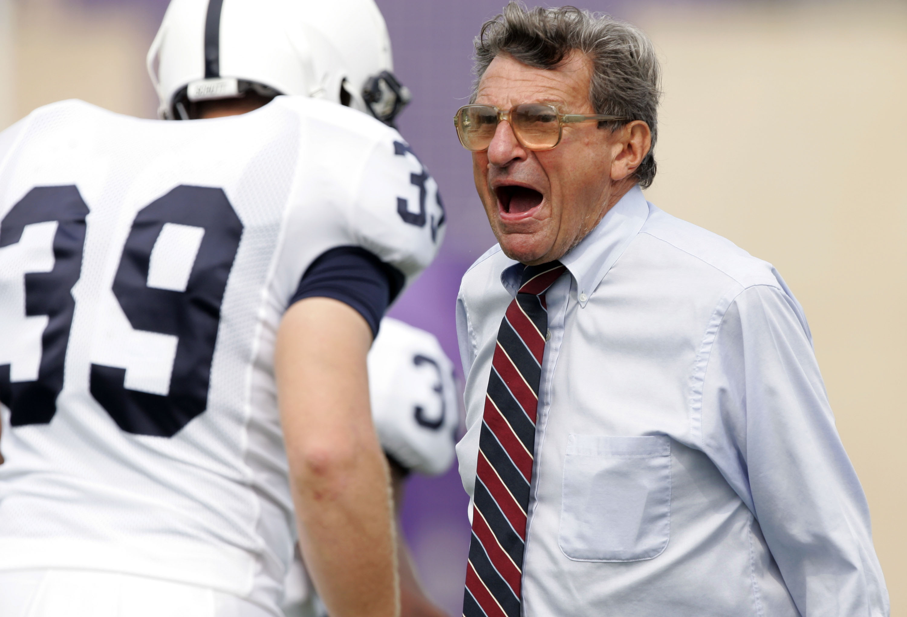 EVANSTON, IL - SEPTEMBER 24: Head coach Joe Paterno of the Penn State Nittany Lions yells at linebacker Kevin Darling #39 against the Northwestern Wildcats September 24, 2005 at Ryan Field in Evanston, Illinois. Penn State won 34-29. (Photo by Brian B