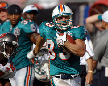 Miami Dolphins wide receiver  Wes Welker rushes upfield on a kick return against the Tampa Bay Buccaneers October 16, 2005 in Tampa.  The Bucs defeated the Dolphins  27-13.  (Photo by Al Messerschmidt/Getty Images)
