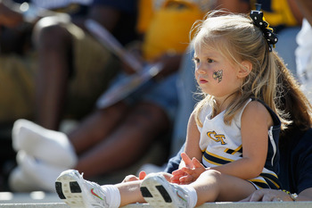 ATLANTA - OCTOBER 09:  A young fan of the Georgia Tech Yellow Jackets looks on before the game against the Virginia Cavaliers at Bobby Dodd Stadium on October 9, 2010 in Atlanta, Georgia.  (Photo by Kevin C. Cox/Getty Images)