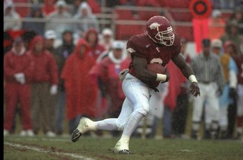 29 Nov 1996: Running back Oscar Malone of the Arkansas Razorbacks moves the ball during a game against the Louisiana State Tigers at the War Memorial Stadium in Little Rock, Arkansas. LSU won the game, 17-7.