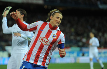MADRID, SPAIN - JANUARY 20:  Diego Forlan of Atletico Madrid reacts during the Copa del Rey quarter final second leg match between Atletico Madrid and Real Madrid at Vicente Calderon Stadium on January 20, 2011 in Madrid, Spain.  (Photo by Denis Doyle/Get