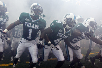 NEW ORLEANS - SEPTEMBER 11:  Members of the Tulane Green Wave take the field before playing the Ole Miss Rebels at the Louisiana Superdome on September 11, 2010 in New Orleans, Louisiana.  (Photo by Chris Graythen/Getty Images)