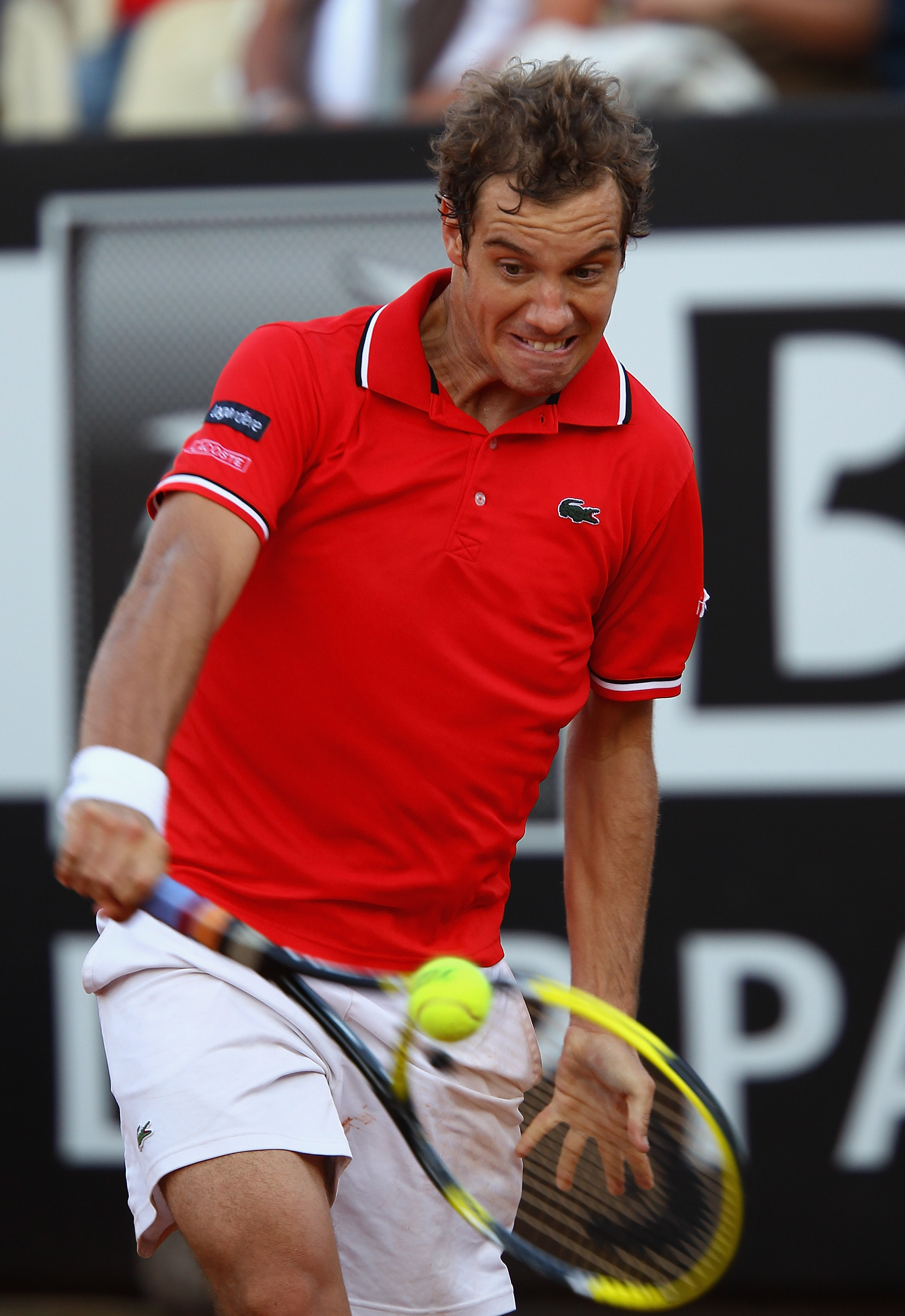 ROME, ITALY - MAY 13: Richard Gasquet of France plays a backhand during his quarter final match against Tomas Berdych of Czech Republic during day six of the Internazoinali BNL D'Italia at the Foro Italico Tennis Centre on May 13, 2011 in Rome, Italy.