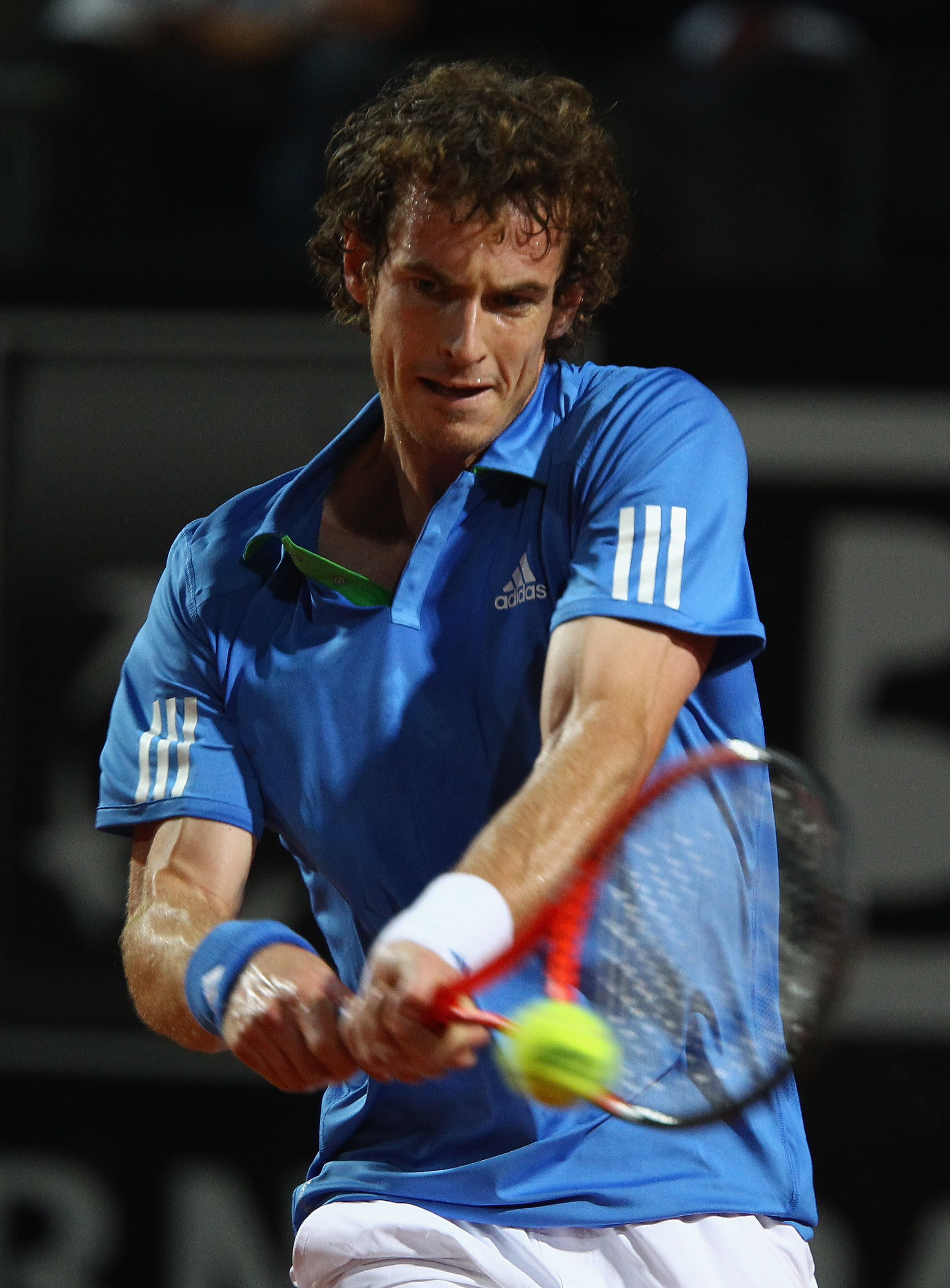 ROME, ITALY - MAY 10: Andy Murray of Great Britain plays a back hand during his second round match against Xavier Malisse of Belgium during day three of the Internazoinali BNL D'Italia at the Foro Italico Tennis Centre on May 10, 2011 in Rome, Italy. (Ph
