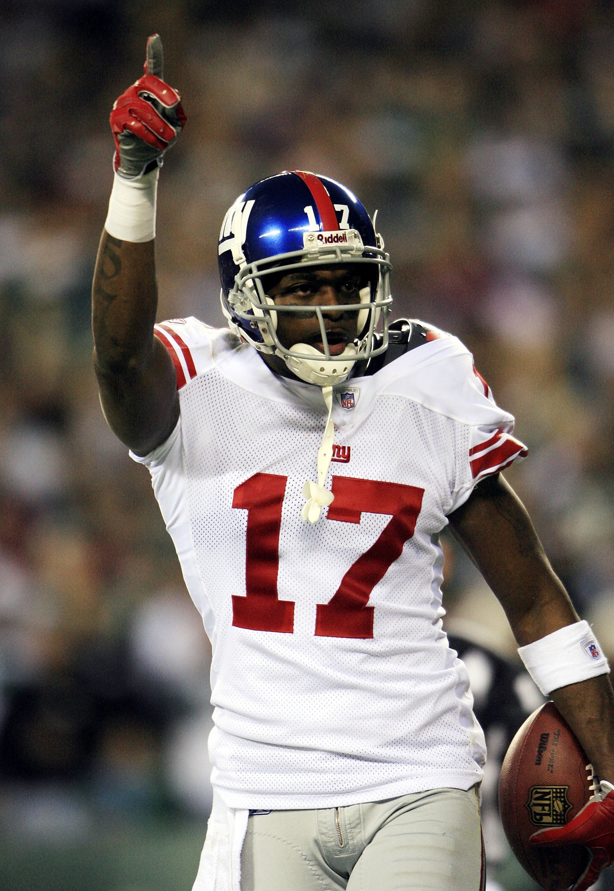 PHILADELPHIA - JANUARY 07:  Plaxico Burress #17 of the New York Giants celebrates his 17-yard touchdown against the Philadelphia Eagles in the first quarter during their NFC Wildcard Playoff game on January 7, 2007 at Lincoln Financial Field in Philadelph