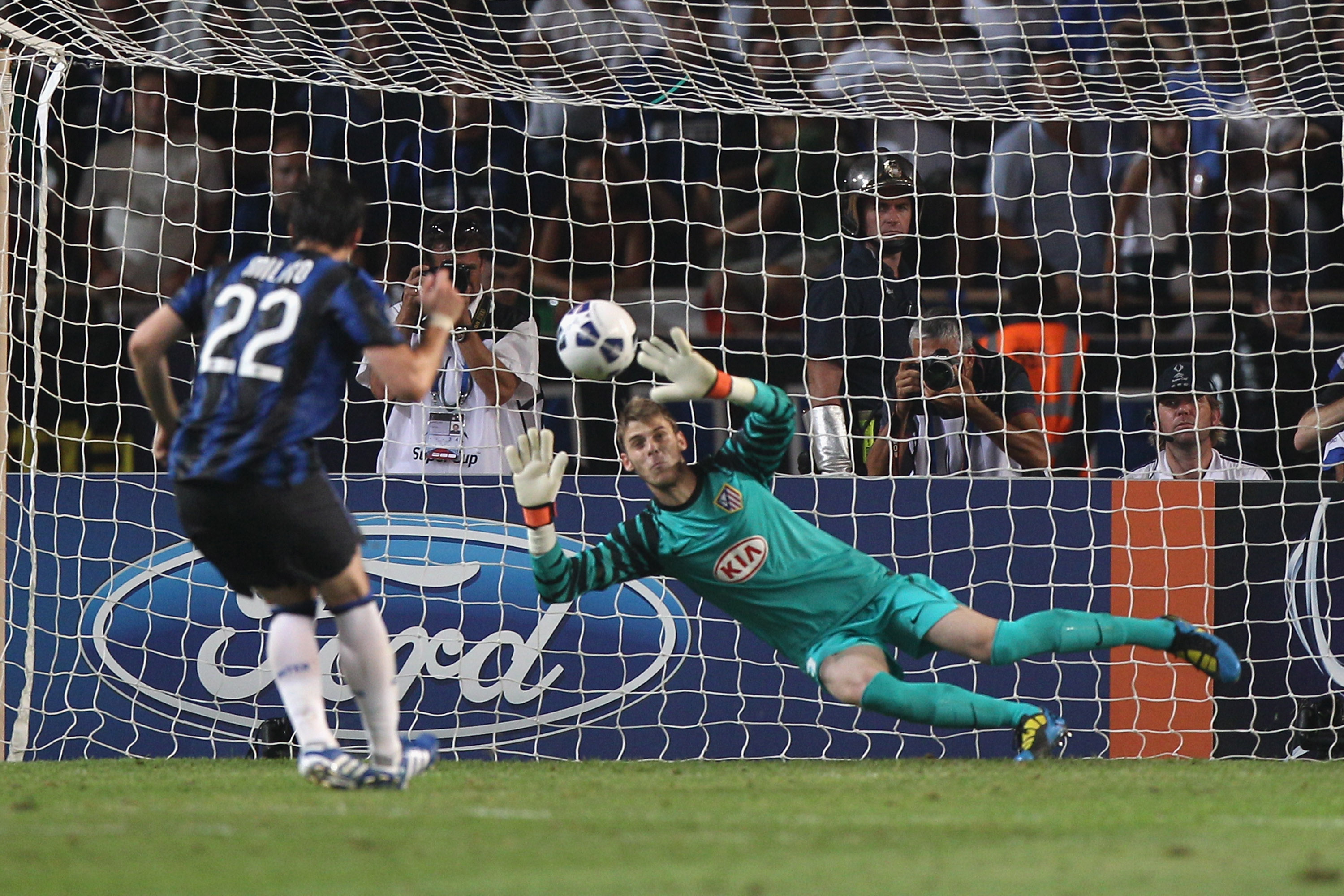 MONACO - AUGUST 27:  David de Gea of Atletico saves a penalty from Diego Milito of Inter during the UEFA Super Cup match between Inter Milan and Atletico Madrid at Louis II Stadium on August 27, 2010 in Monaco, Monaco.  (Photo by Michael Steele/Getty Imag