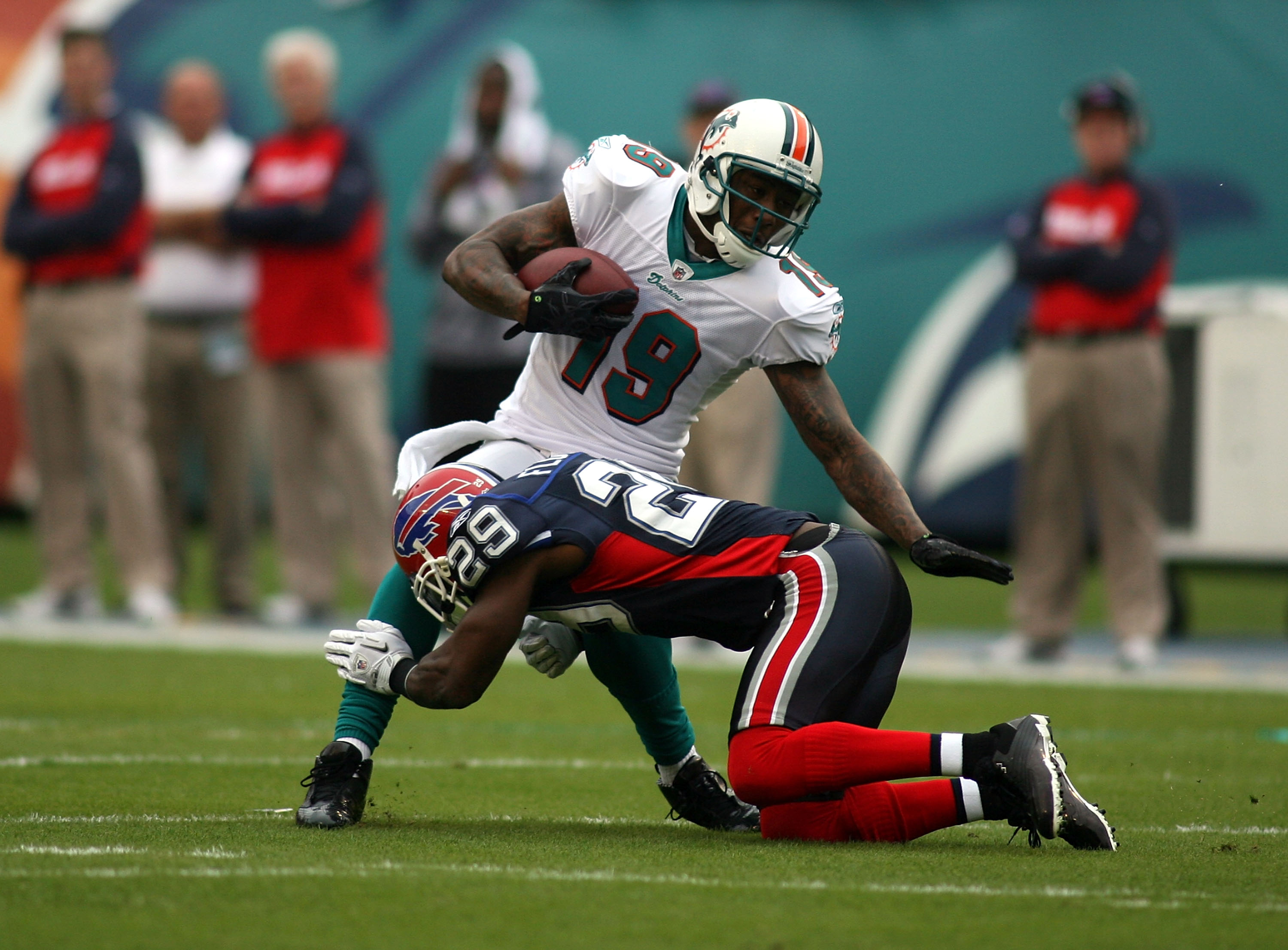 Miami Dolphins wide receiver Brandon Marshall (19) runs the ball during  first half action, between the Miami Dolphins, and the New York Jets  January 1, 2012 at Sun Life Stadium in Miami