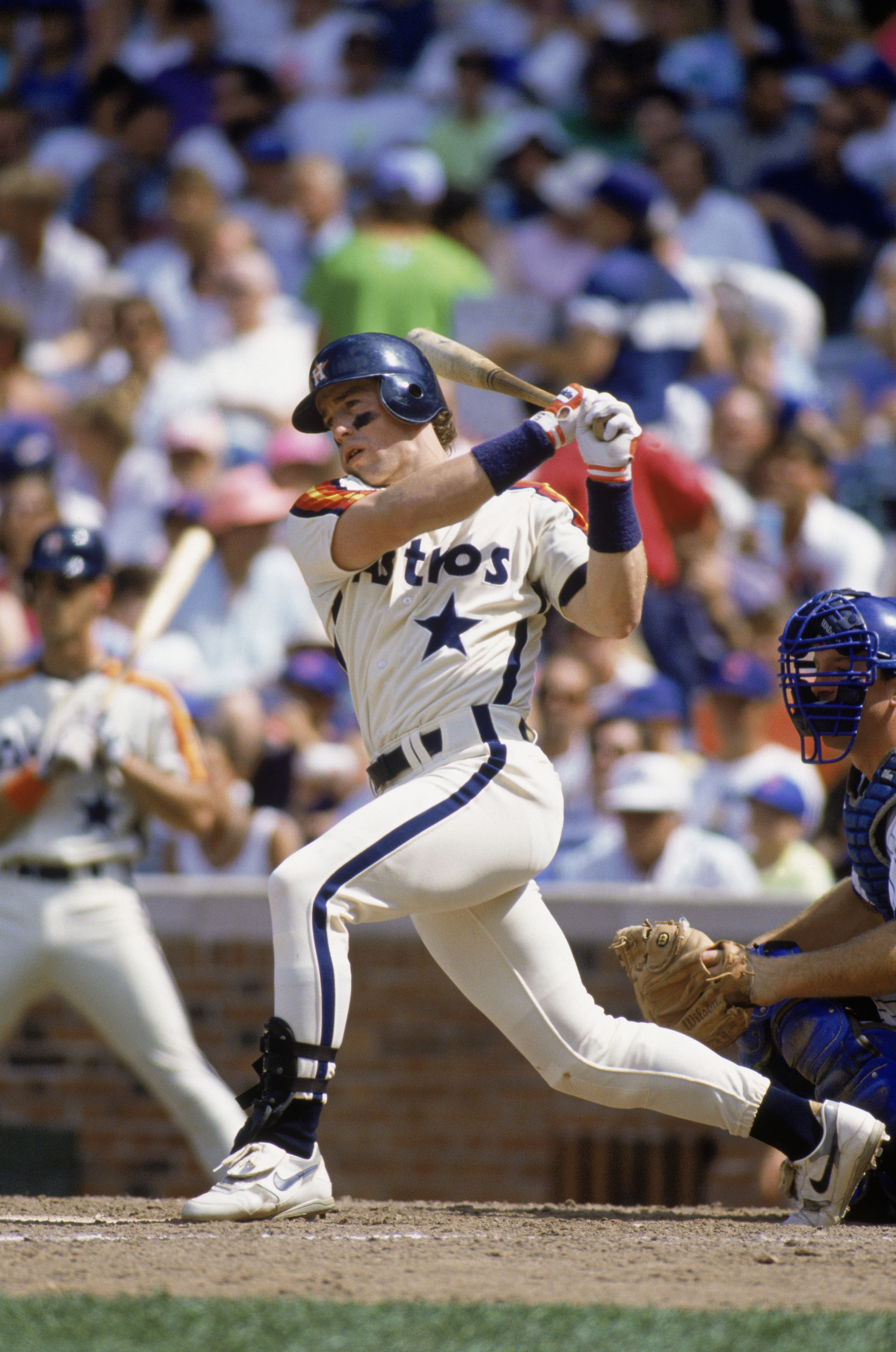 CHICAGO - 1991:  First baseman Jeff Bagwell #5 of the Houston Astros swings at the pitch during the MLB game against the Chicago Cubs at Wrigley Field during the 1991 season in Chicago, Illinois.  (Photo by Jonathan Daniel/Getty Images)