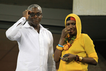 NEW YORK - SEPTEMBER 07:  (L-R) Track and Field Olympic Gold Medalist Carl Lewis and actor Grace Jones attend the men's singles match between Rafael Nadal and Feliciano Lopez of Spain during day nine of the 2010 U.S. Open at the USTA Billie Jean King Nati