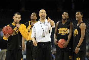 HOUSTON, TX - APRIL 01:  Head coach Shaka Smart of the Virginia Commonwealth Rams points as he stands next to Joey Rodriguez #12, Ed Nixon #50 and Darius Theus #10 during practice prior to the 2011 Final Four of the NCAA Division I Men's Basketball Tourna