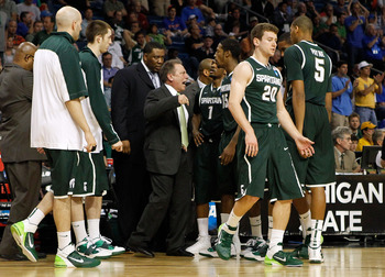 TAMPA, FL - MARCH 17:  Head coach Tom Izzo of the Michigan State Spartans address his players during a timeout in the second half against the UCLA Bruins during the second round of the 2011 NCAA men's basketball tournament at St. Pete Times Forum on March