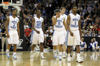 NEWARK, NJ - MARCH 27:  Leslie McDonald #2, Harrison Barnes #40, Kendall Marshall #5, Tyler Zeller #44 and Dexter Strickland #1 of the North Carolina Tar Heels walks of the court after being defeated by the Kentucky Wildcats in the east regional final of