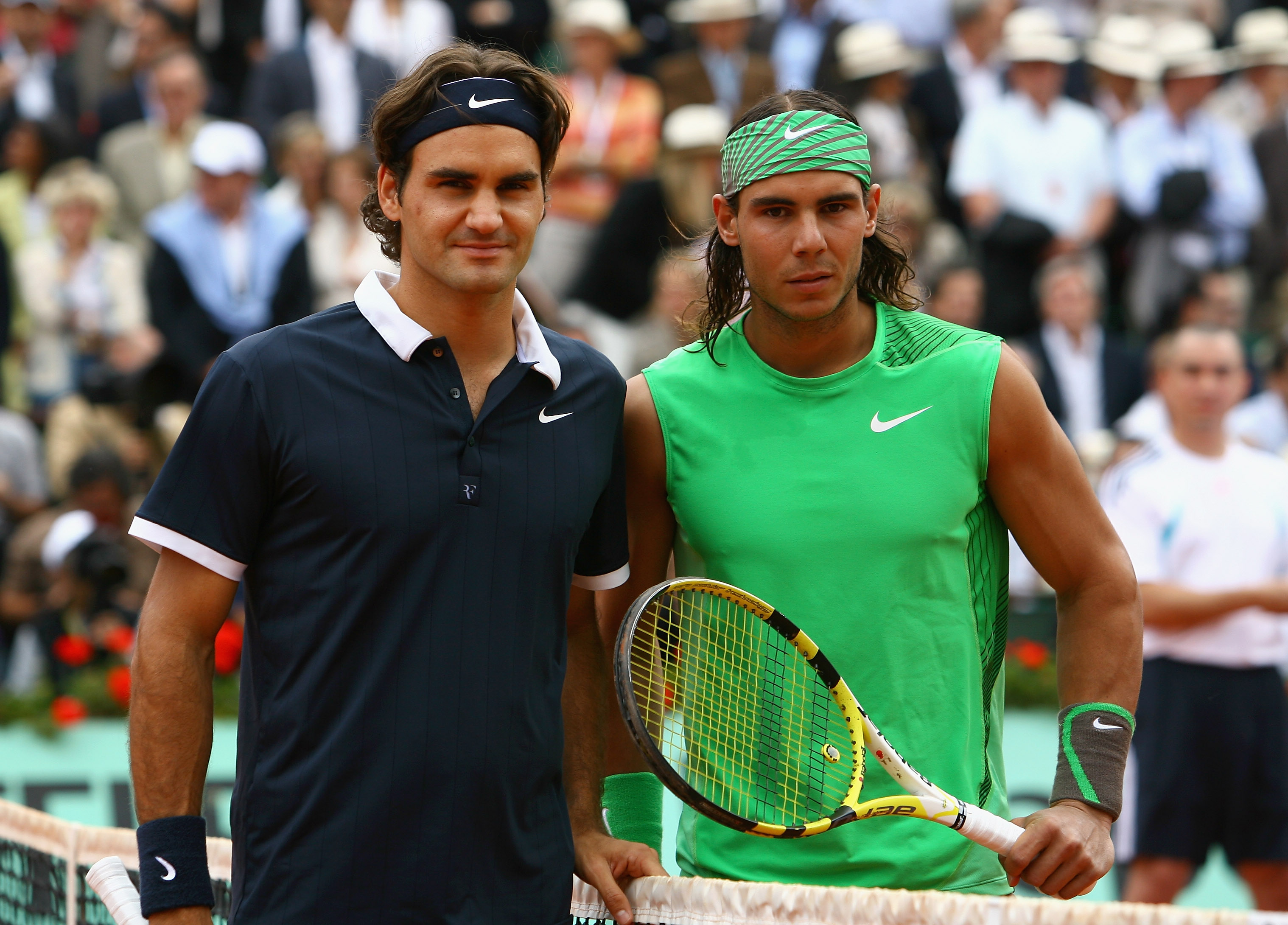 PARIS - JUNE 08:  Roger Federer (L) of Switzerland and Rafael Nadal of Spain line up for a photo before the Men's Singles Final match on day fifteen of the French Open at Roland Garros on June 8, 2008 in Paris, France.  (Photo by Julian Finney/Getty Image