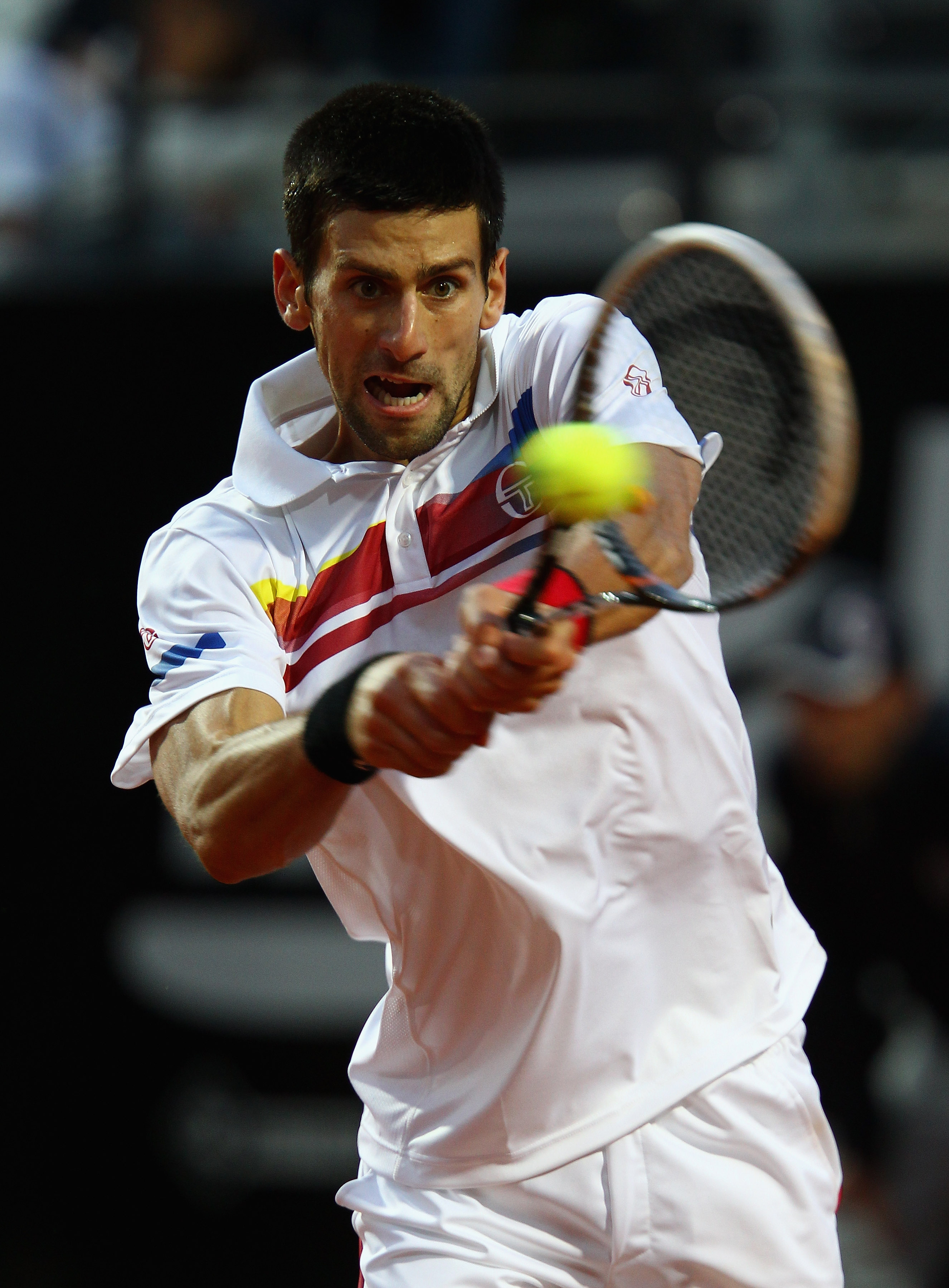 ROME, ITALY - MAY 15: Novak Djokovic of Serbia in action during the final against Rafael Nadal of Spain during day eight of the Internazoinali BNL D'Italia at the Foro Italico Tennis Centre on May 15, 2011 in Rome, Italy. (Photo by Clive Brunskill/Getty
