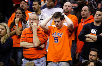 CLEVELAND, OH - MARCH 20: The Syracuse Orange fans look on after their team was defeated by the Marquette Golden Eagles during the third of the 2011 NCAA men's basketball tournament at Quicken Loans Arena on March 20, 2011 in Cleveland, Ohio.  (Photo by G