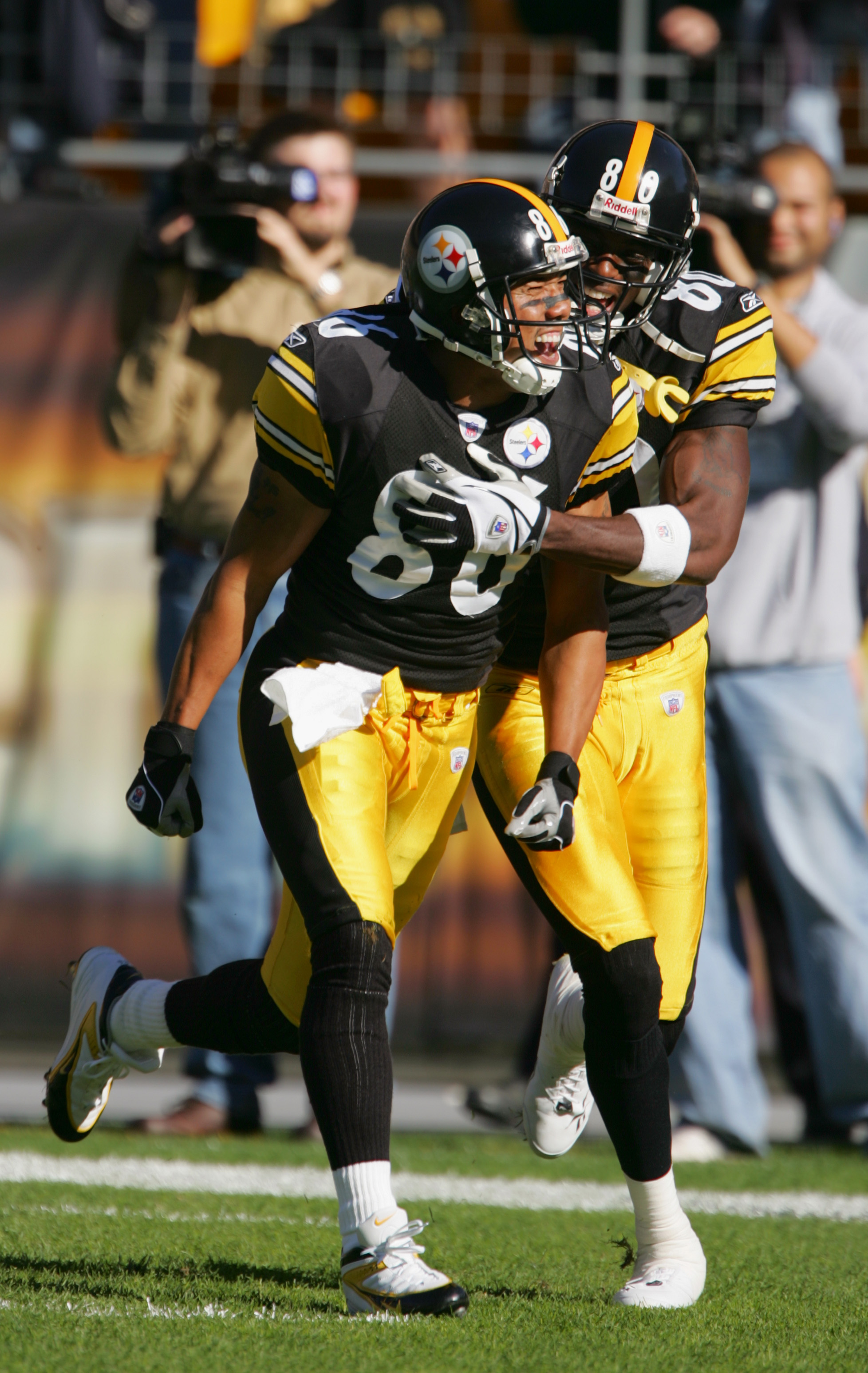 Pittsburgh Steelers running back Rashard Mendenhall(34) is tackled by  Cleveland Browns safety T.J. Ward(43)