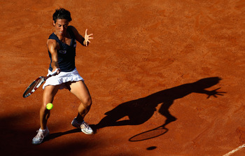 ROME, ITALY - MAY 13:  Francesca Schiavone of Italy plays a forehand during her quarter final match against Samantha Stosur of Australia  during day six of the Internazoinali BNL D'Italia at the Foro Italico Tennis Centre  on May 13, 2011 in Rome, Italy.