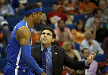 TULSA, OK - MARCH 18:  Head coach Josh Pastner of the Memphis Tigers speaks with Will Coleman #0 during the second round game against the Arizona Wildcats in the 2011 NCAA men's basketball tournament at BOK Center on March 18, 2011 in Tulsa, Oklahoma.  (P