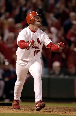 ST LOUIS - OCTOBER 20:  Jim Edmonds #15 of the St. Louis Cardinals reacts to hitting a game-winning two-run home run in the bottom of the 12th inning giving the Cardinals a 6-4 victory over the Houston Astros in Game 6 of the National League Championship