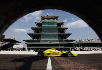 INDIANAPOLIS, IN - MAY 20: Ed Carpenter, driver of the #67 Dollar General/Srah Fisher Racing Dallara Honda, passes the pagoda on the front stretch during practice for the Indianapolis 500 on May 20, 2011 at Indianapolis Motor Speedway in Indianapolis, In