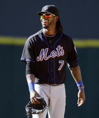 HOUSTON - MAY 14:  Shortstop Jose Reyes #7 of the New York Mets smiles at his bench after he intentionally dropped a soft line drive trying to double off Brett Wallace #2 of the Houston Astros in the seventh inning at Minute Maid Park on May 14, 2011 in H