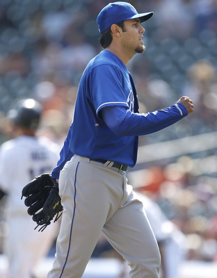 DETROIT, MI - APRIL 10: Joakim Soria #48 of the Kansas City Royals reacts after beating the Detroit Tigers 9-5 at Comerica Park on April 10, 2011 in Detroit, Michigan.  (Photo by Gregory Shamus/Getty Images)