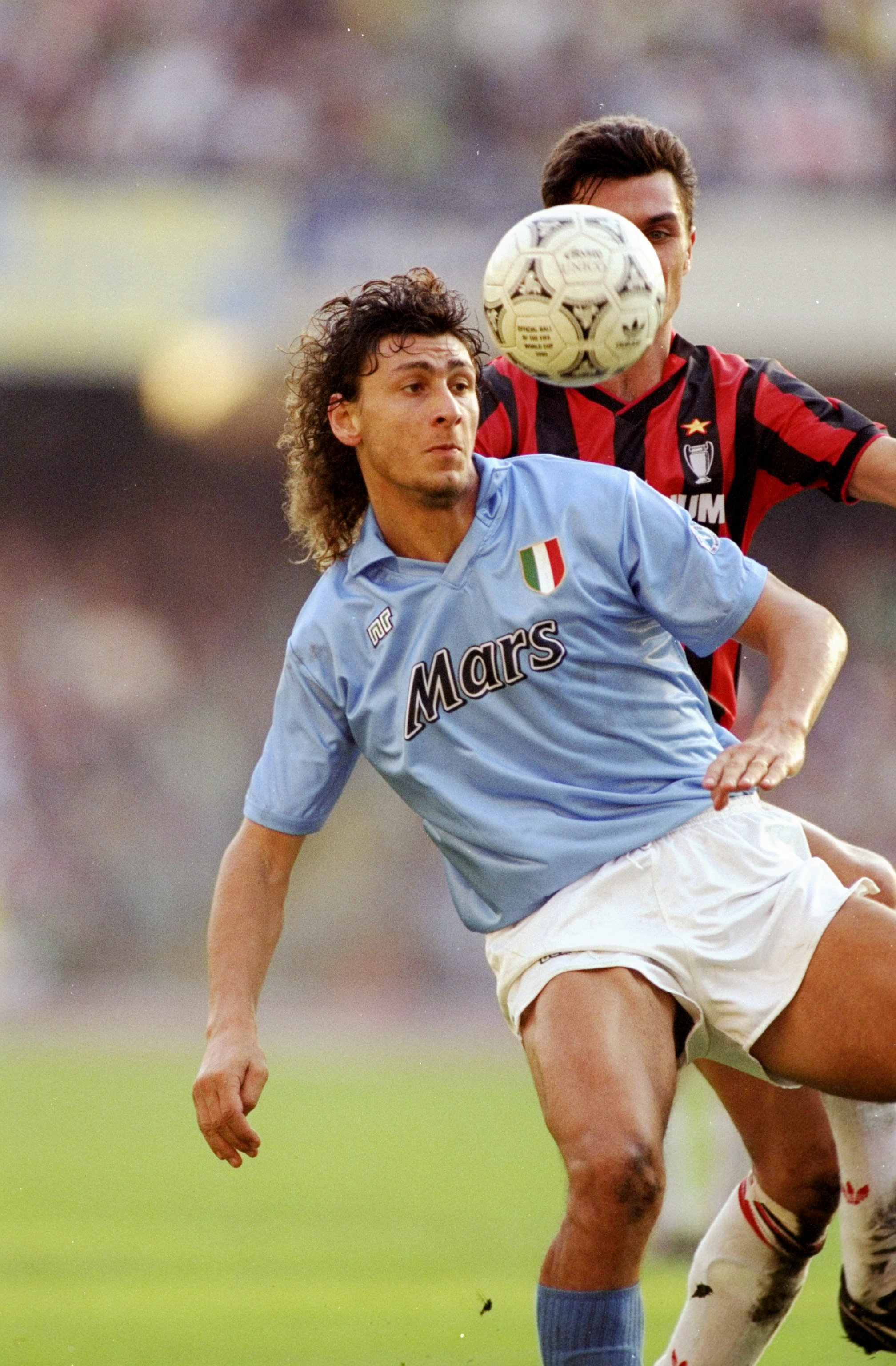 21 Oct 1990: Andrea Silenzi (front) of Napoli is shadowed by Paolo Maldini of AC Milan during an Italian League match at the San Paolo Stadium in Naples, Italy. The match ended in a 1-1 draw. \ Mandatory Credit: Simon Bruty/Allsport