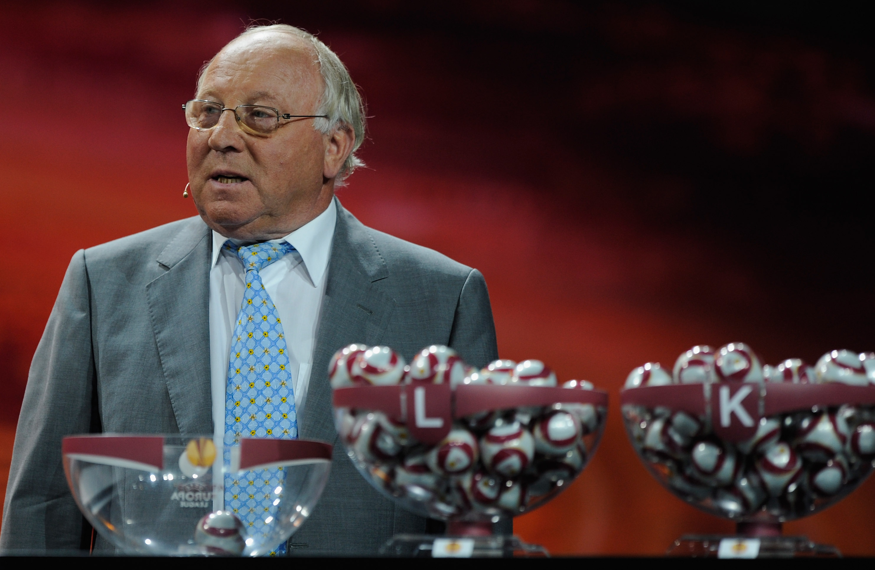 MONACO - AUGUST 28:  Uwe Seeler former German and Werder Bremen player draws the balls during the UEFA Europa League Group Stage Draw at the Grimaldi Forum on August 28, 2009 in Monaco, Monaco.  (Photo by Laurence Griffiths/Getty Images)