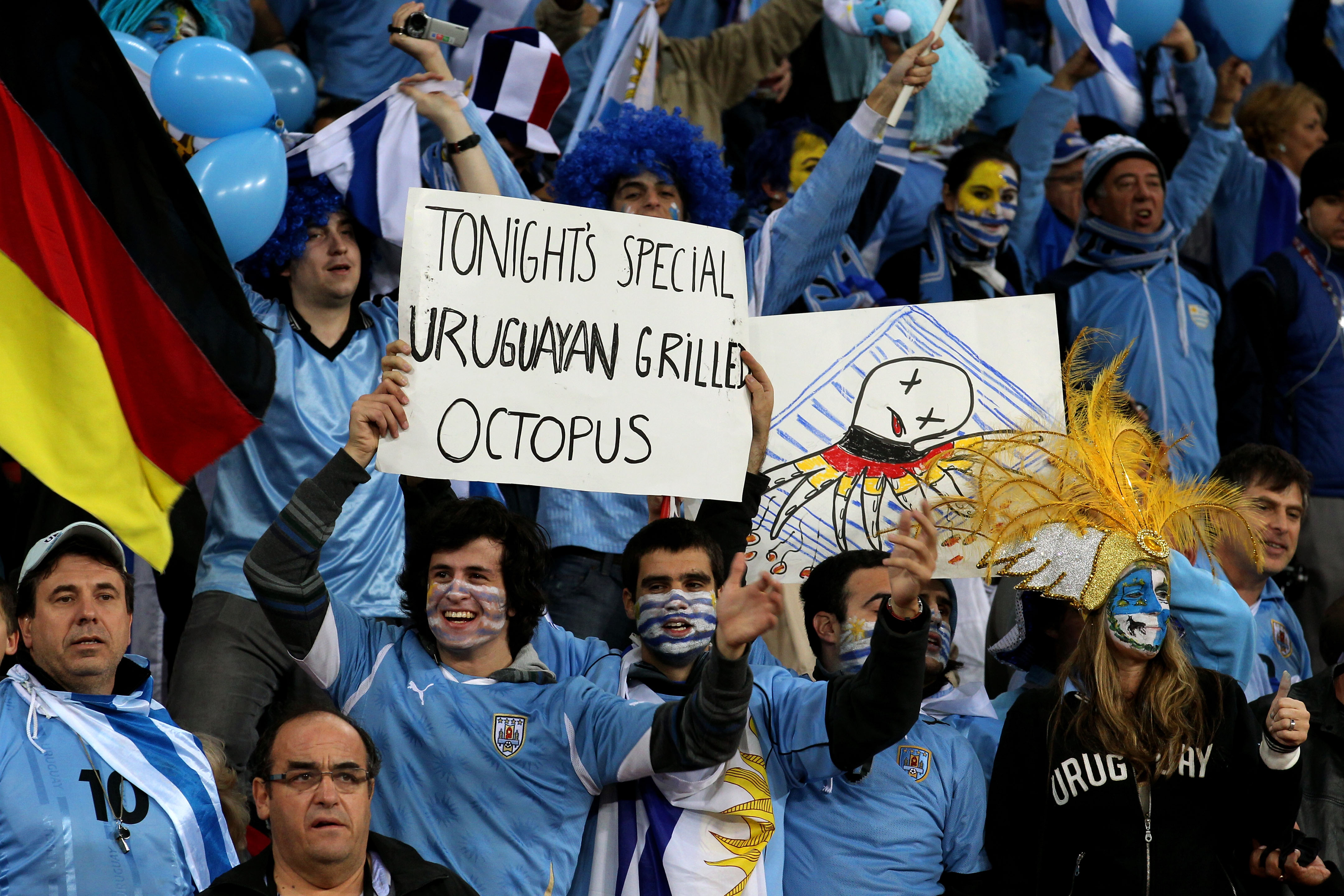 PORT ELIZABETH, SOUTH AFRICA - JULY 10: Uruguay fans enjoy the atmosphere prior to the 2010 FIFA World Cup South Africa Third Place Play-off match between Uruguay and Germany at The Nelson Mandela Bay Stadium on July 10, 2010 in Port Elizabeth, South Afri