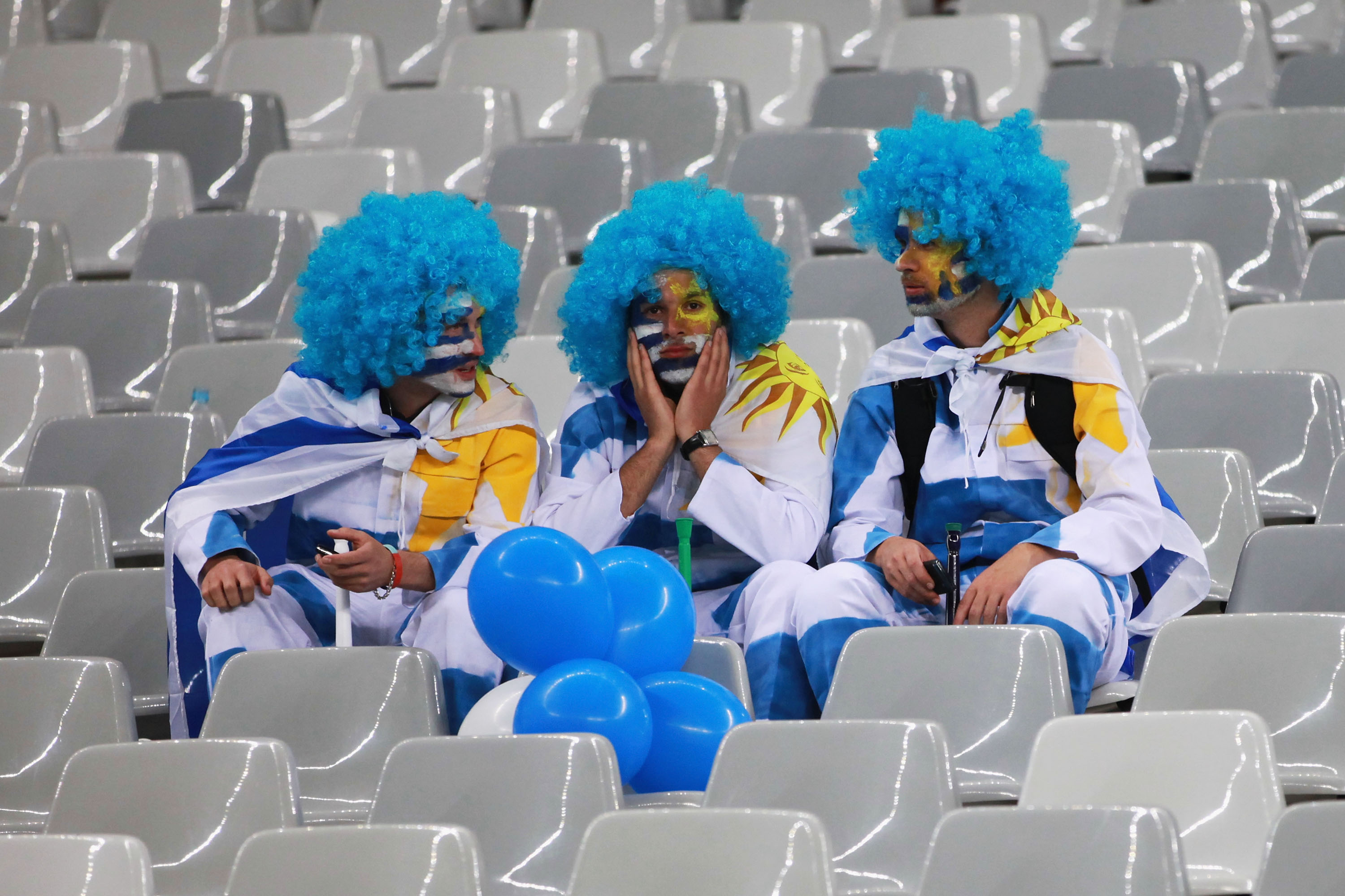 CAPE TOWN, SOUTH AFRICA - JULY 06:  Uruguay show their dejection after suffering defeat in the 2010 FIFA World Cup South Africa Semi Final match between Uruguay and the Netherlands at Green Point Stadium on July 6, 2010 in Cape Town, South Africa.  (Photo
