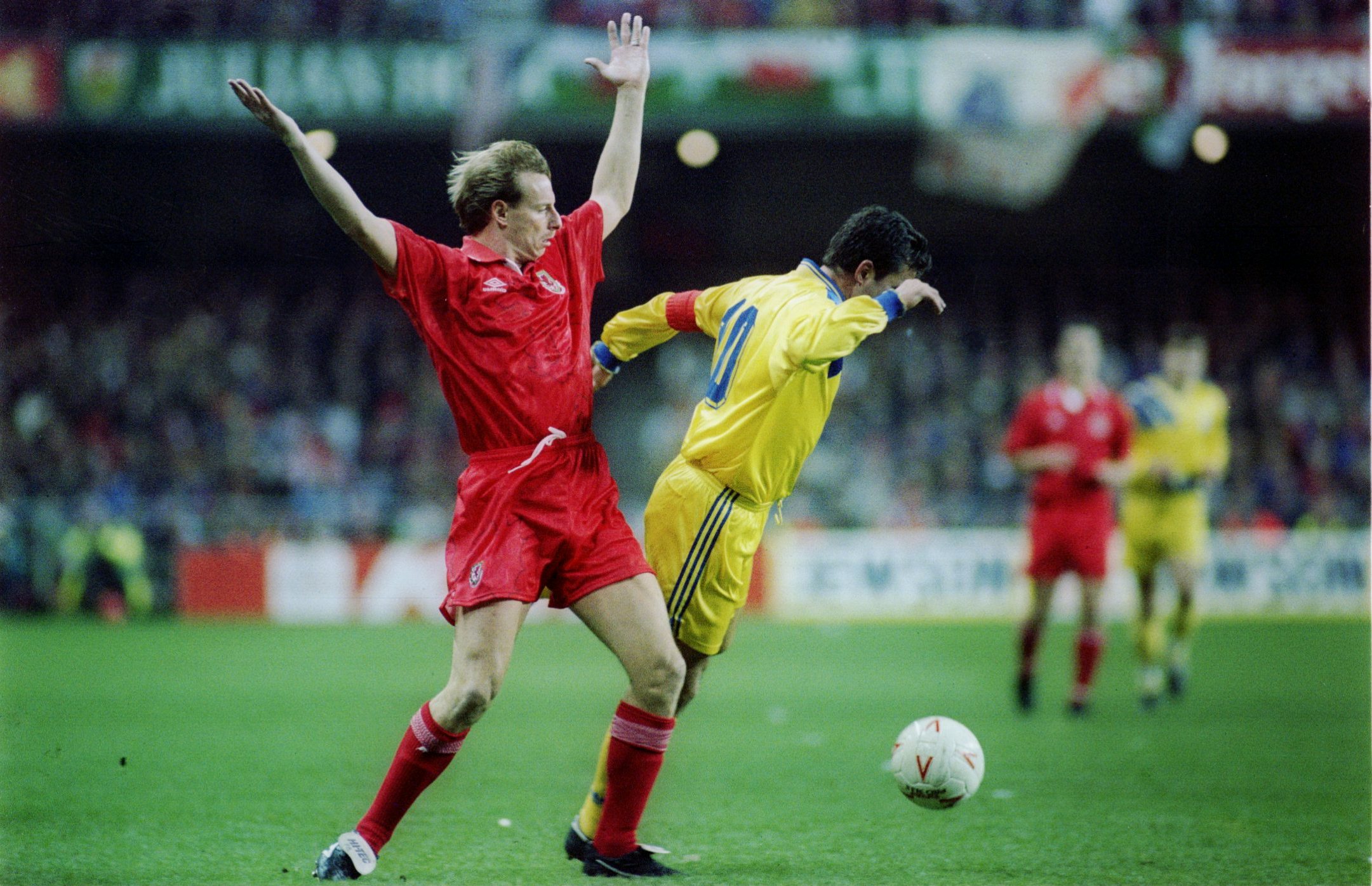 17 NOV 1993:  GEORGHE HAGI OF ROMANIA IN ACTION AGAINST PAUL BODIN OF WALES DURING THEIR WORLD CUP QUALIFYING MATCH. ROMANIA WON 2-1. Mandatory Credit: Chris Cole/ALLSPORT