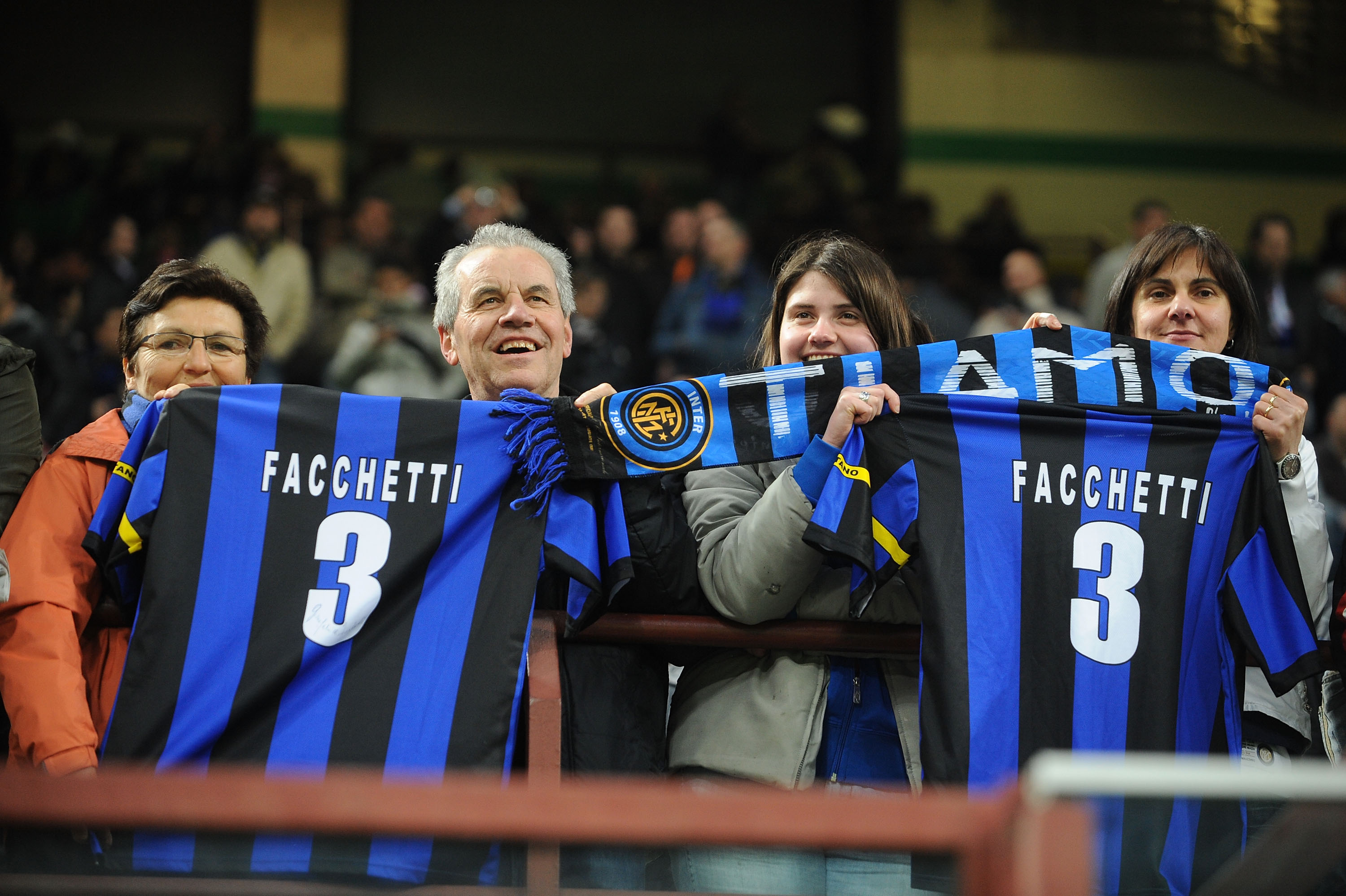 MILAN, ITALY - APRIL 16: Fans of FC Internazionale MIlano hold up shirts of former player Giacinto Facchetti, during the Serie A match between FC Internazionale Milano and Juventus FC at Stadio Giuseppe Meazza on April 16, 2010 in Milan, Italy.  (Photo by