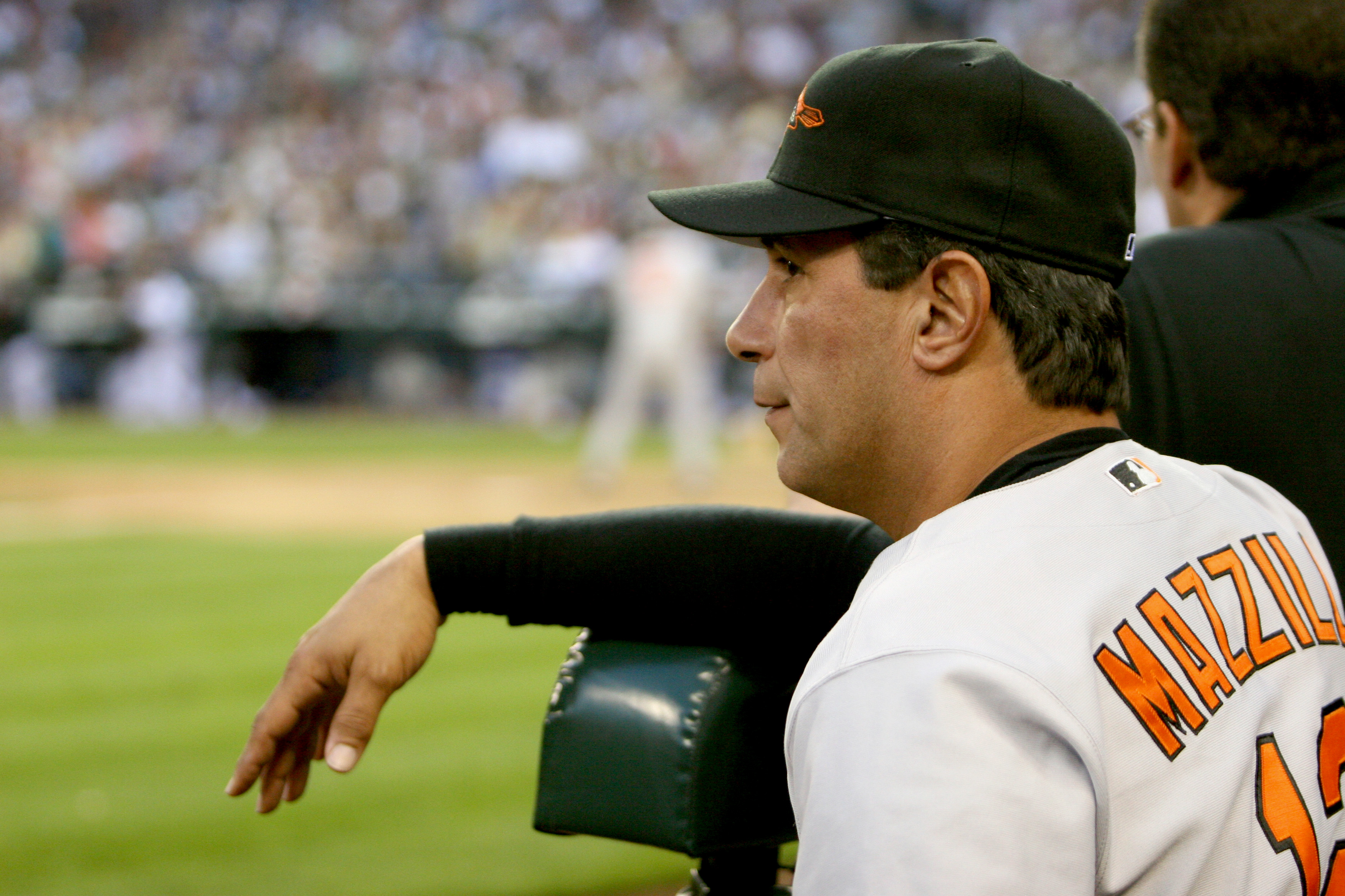 SEATTLE - JULY 14:  Manager Lee Mazzilli #12 of the Baltimore Orioles watches the game against the Seattle Mariners on July 14, 2005 at Safeco Field in Seattle Washington. The Orioles won 5-3.  (Photo by Otto Greule Jr/Getty Images)
