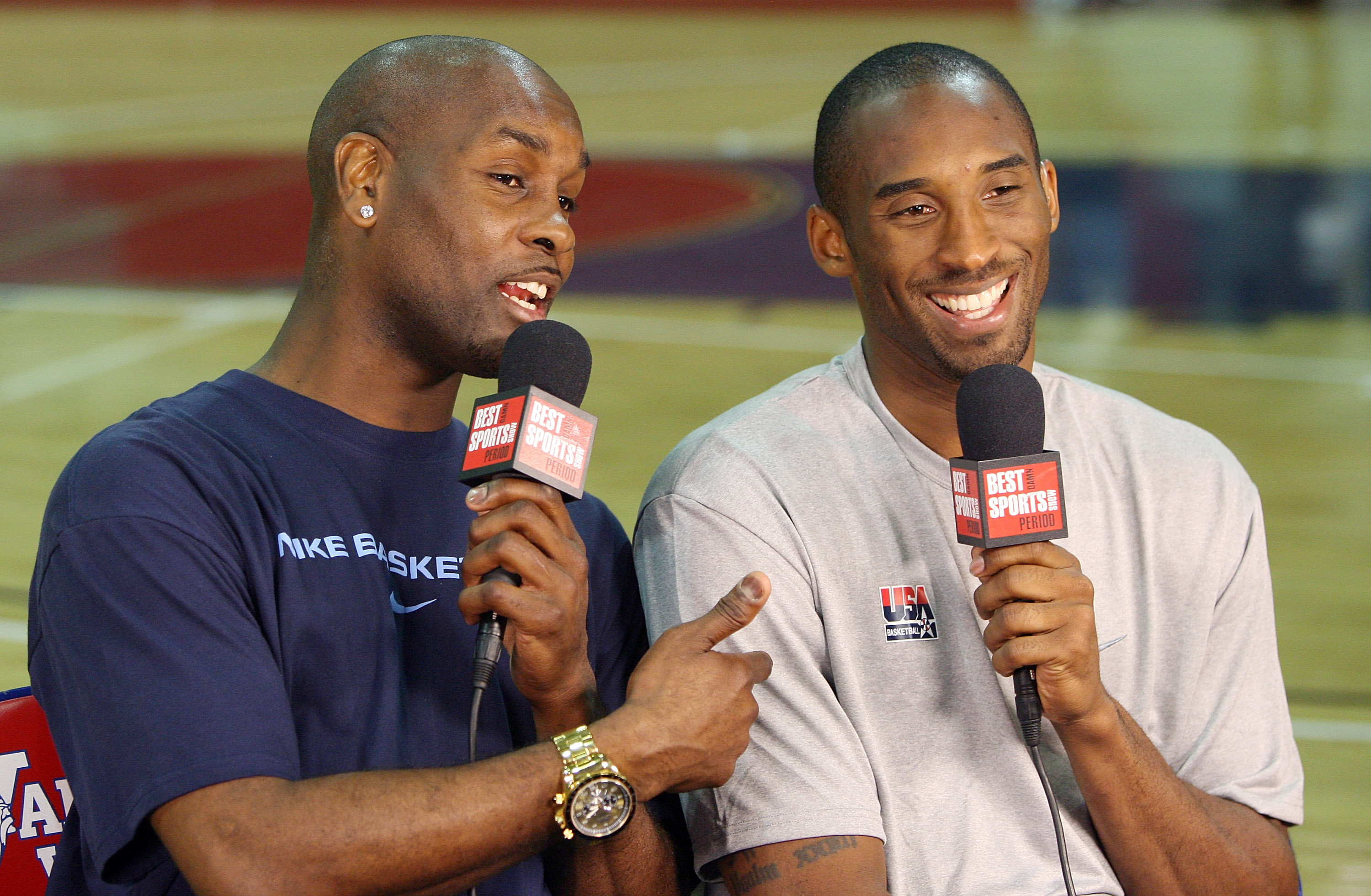 LAS VEGAS - JULY 24:  Gary Payton (L) interviews Kobe Bryant #10 of the USA Basketball Men's Senior National Team on the 'Best Damn Sports Show Period' after a practice at Valley High School June 24, 2008 in Las Vegas, Nevada.  (Photo by Ethan Miller/Gett