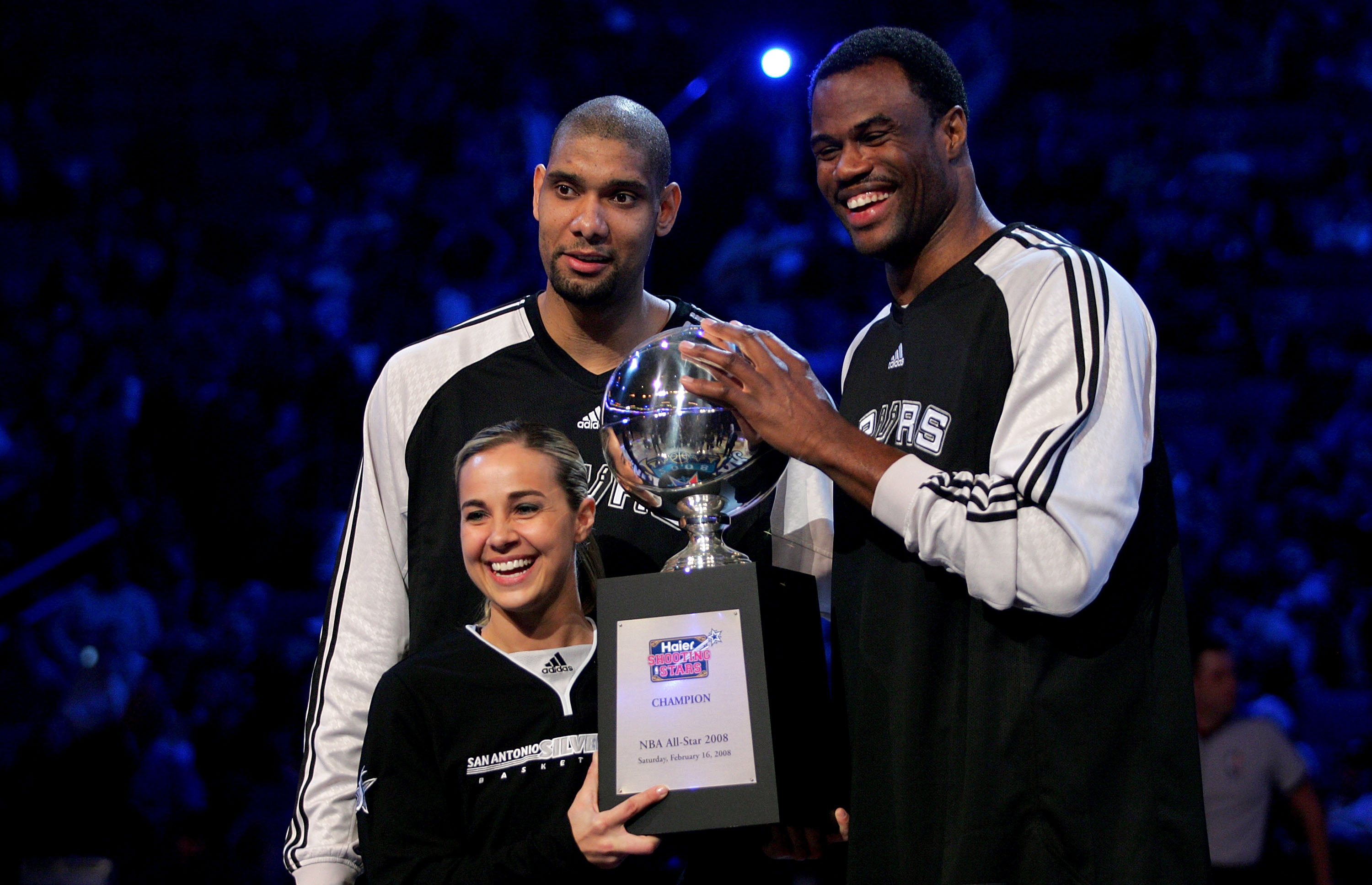 NEW ORLEANS - FEBRUARY 16:  Tim Duncan of the San Antonio Spurs, NBA legend David Robinson and WNBA player Becky Hammon of the San Antonio Silver Star pose with the championship trophy after winning the Haier Shooting Stars competition, part of 2008 NBA A