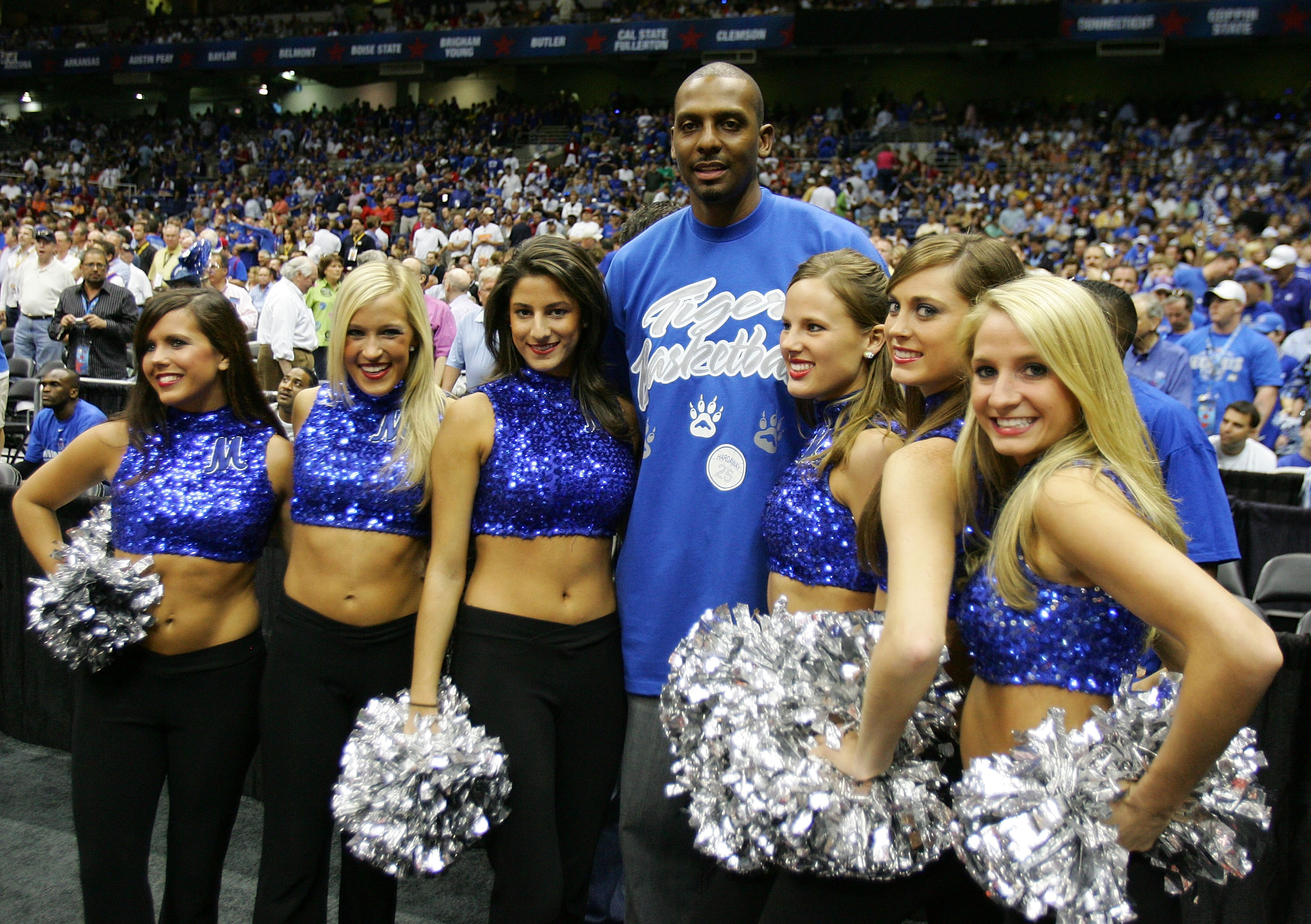 SAN ANTONIO - APRIL 07: Former Memphis Tigers player Anfernee ?Penny? Hardaway poses with the Tigers dance team prior to the start of the 2008 NCAA Men's National Championship game against the Kansas Jayhawks at the Alamodome on April 7, 2008 in San Anto
