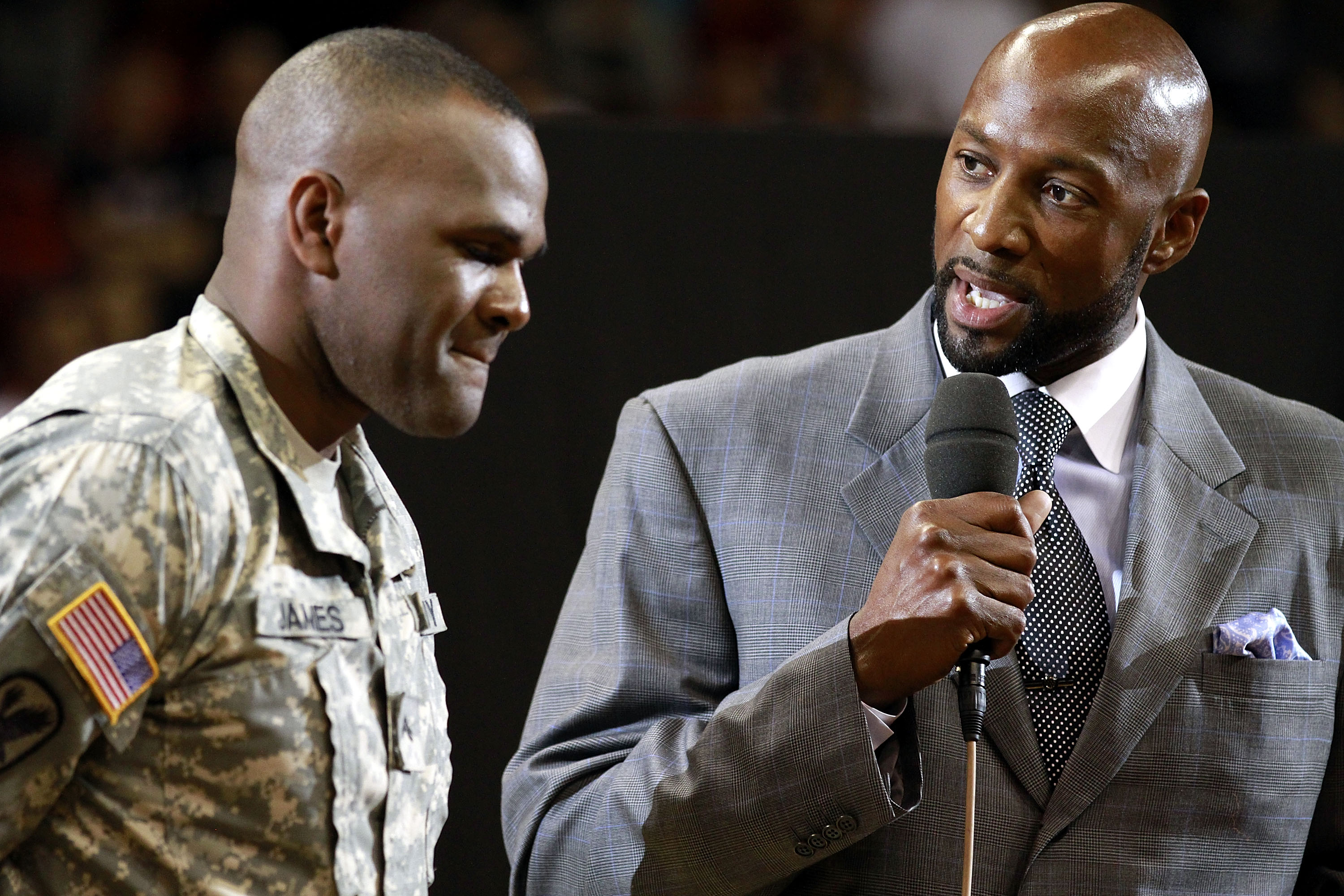 MIAMI, FL - MARCH 19:  Former Miami Heat Players Tim James (L) and Alonzo Mourning chat prior to  Miami Heat against the Denver Nuggets at American Airlines Arena on March 19, 2011 in Miami, Florida. NOTE TO USER: User expressly acknowledges and agrees th