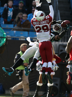 CHARLOTTE, NC - DECEMBER 19:  Dominique Rodgers-Cromartie #29 of the Arizona Cardinals breaks up a pass to Steve Smith #89 of the Carolina Panthers during their game at Bank of America Stadium on December 19, 2010 in Charlotte, North Carolina.  (Photo by 
