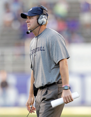 FORT WORTH, TX - OCTOBER 16:  Head coach Bronco Mendenhall of the BYU Cougars heads his team against the TCU Horned Frogs at Amon G. Carter Stadium on October 16, 2010 in Fort Worth, Texas.  TCU beat BYU 31-3.  (Photo by Tom Pennington/Getty Images)