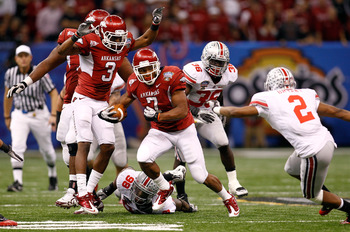 NEW ORLEANS, LA - JANUARY 04:  Knile Davis #7 of the Arkansas Razorbacks runs the ball in the second half against the Ohio State Buckeyes during the Allstate Sugar Bowl at the Louisiana Superdome on January 4, 2011 in New Orleans, Louisiana.  (Photo by Ch