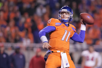 BOISE, ID - NOVEMBER 19:  Kellen Moore #11 of the Boise State Broncos passes against the Fresno State Bulldogs at Bronco Stadium on November 19, 2010 in Boise, Idaho.  (Photo by Otto Kitsinger III/Getty Images)