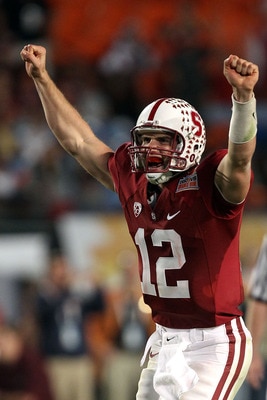MIAMI, FL - JANUARY 03: Andrew Luck #12 of the Stanford Cardinal celebrates after he threw a 38-yard touchdown pass in the fourth quarter against the Virginai Tech Hokies during the 2011 Discover Orange Bowl at Sun Life Stadium on January 3, 2011 in Miam