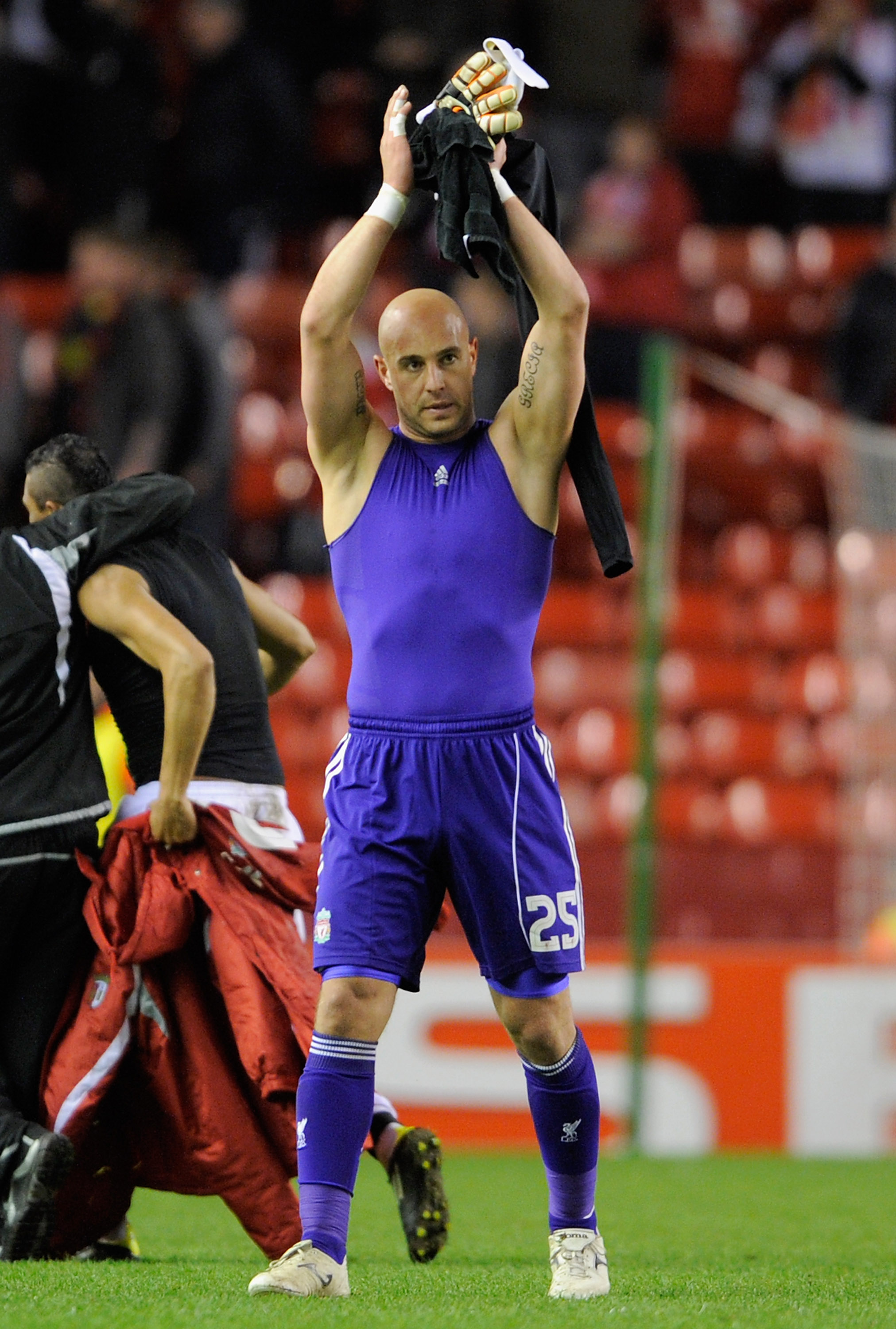 LIVERPOOL, ENGLAND - MARCH 17:  Pepe Reina of Liverpool applauds the fans after defeat in the UEFA Europa League Round of 16 second leg match between Liverpool and SC Braga at Anfield on March 17, 2011 in Liverpool, England.  (Photo by Michael Regan/Getty