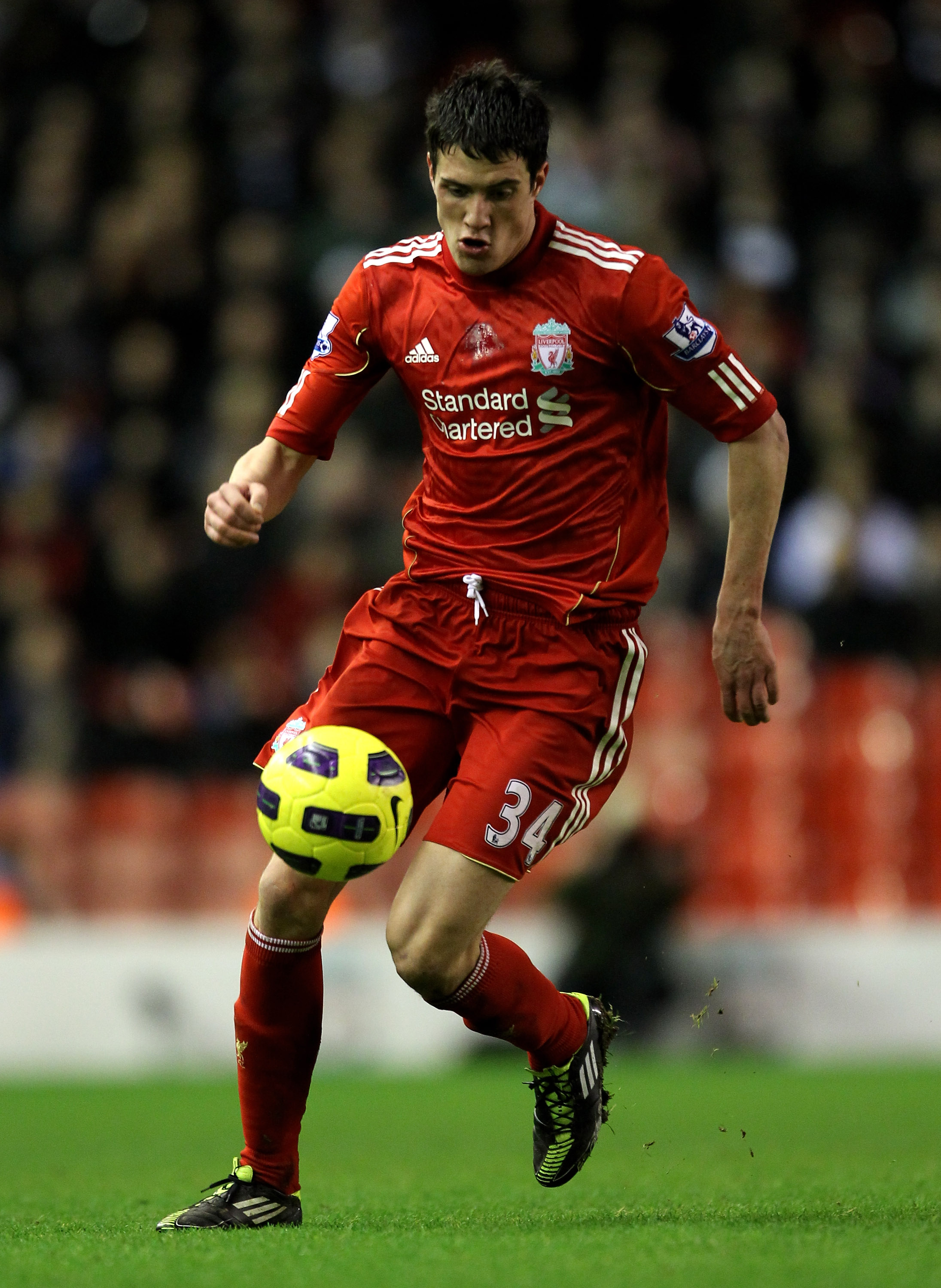 LIVERPOOL, ENGLAND - JANUARY 26:  Martin Kelly of Liverpool in action during the Barclays Premier League match between Liverpool and Fulham at Anfield on January 26, 2011 in Liverpool, England. (Photo by Alex Livesey/Getty Images)