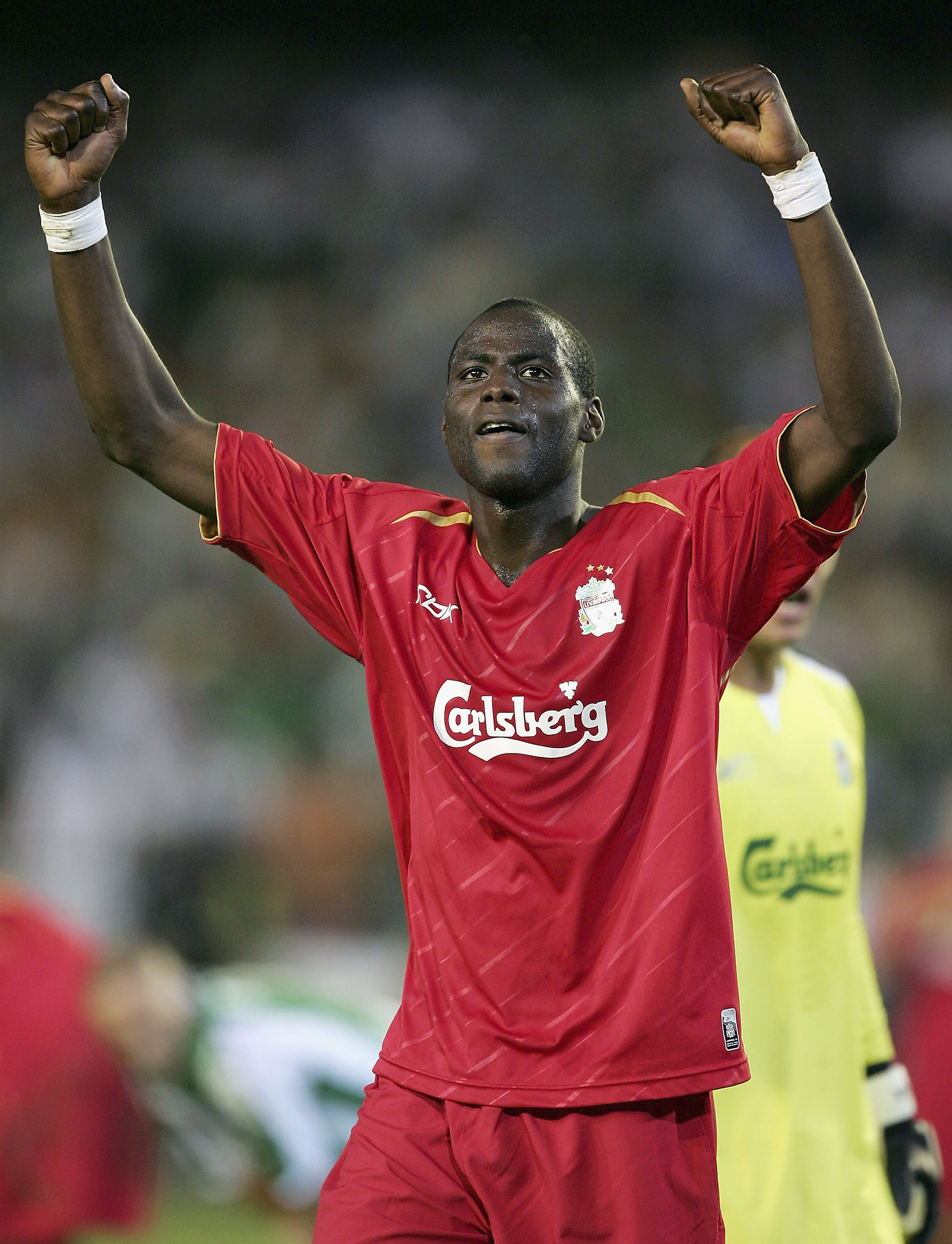 SEVILLE, SPAIN -  SEPTEMBER 13:  Djimi Traore of Liverpool celebrates after Liverpool's 2-1 victory in the UEFA Champions League Group G match between Real Betis and Liverpool at the Estadio Ruiz de Lopera on September 13, 2005  in Seville, Spain. (Photo