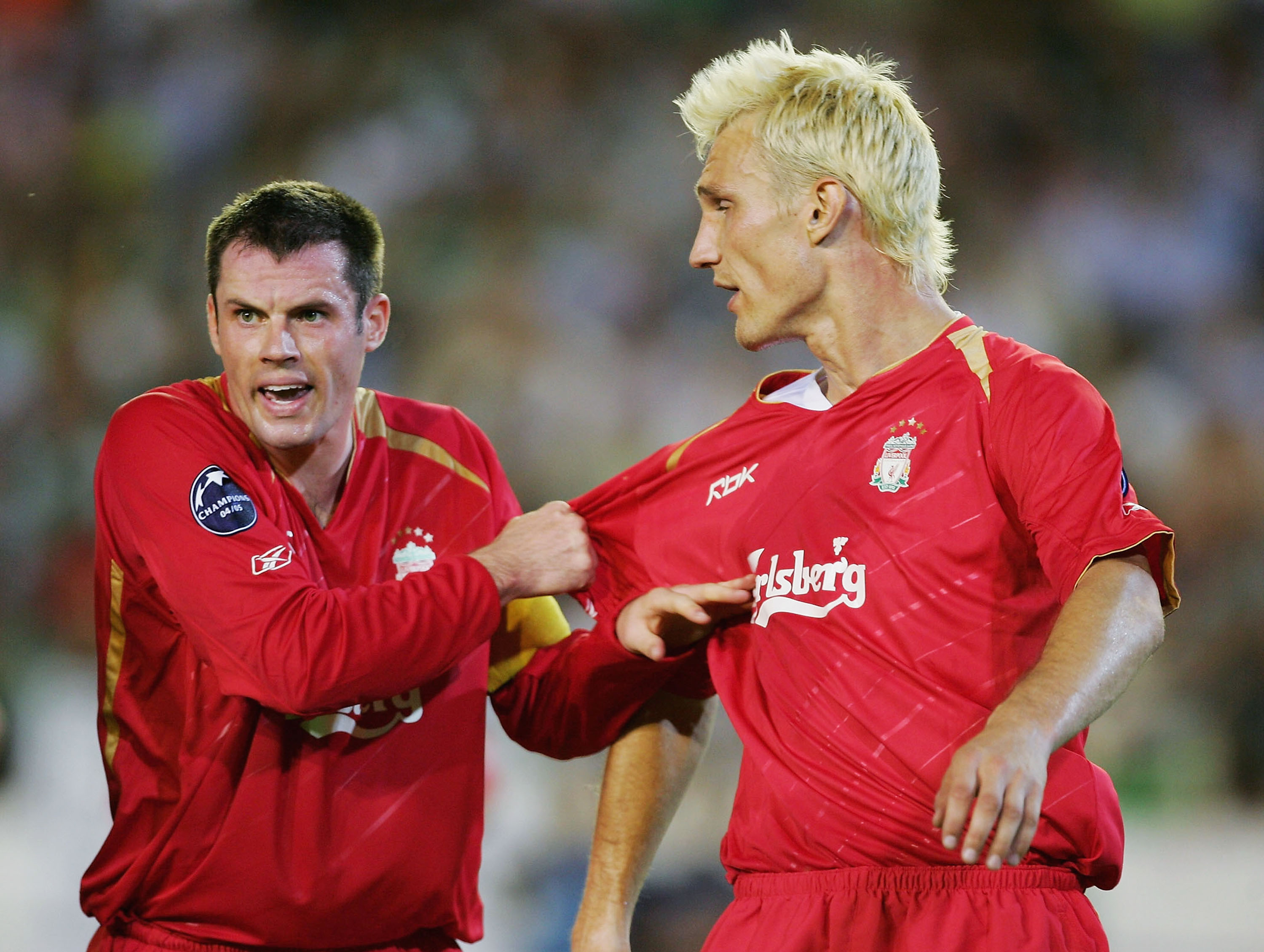 SEVILLE, SPAIN -  SEPTEMBER 13: Liverpool captain Jamie Carragher barks orders to team-mate Sami Hyypia during a second half onslaught by Real Betis during the UEFA Champions League Group G match between Real Betis and Liverpool at the Estadio Ruiz de Lop